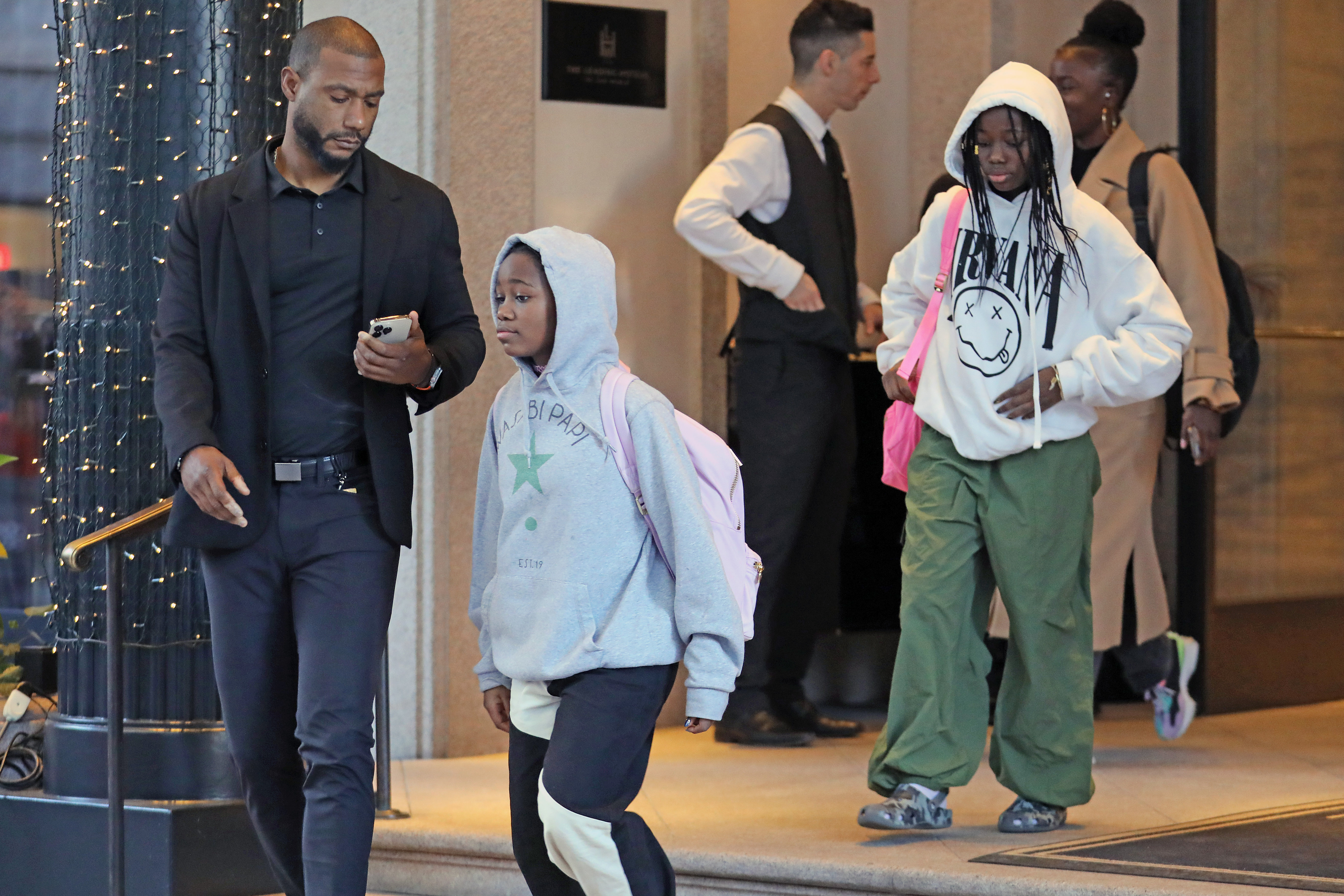 Madonna's twin daughters, Estere and Stella, spotted out in Milan, Italy on  November 25, 2023 | Source: Getty Images