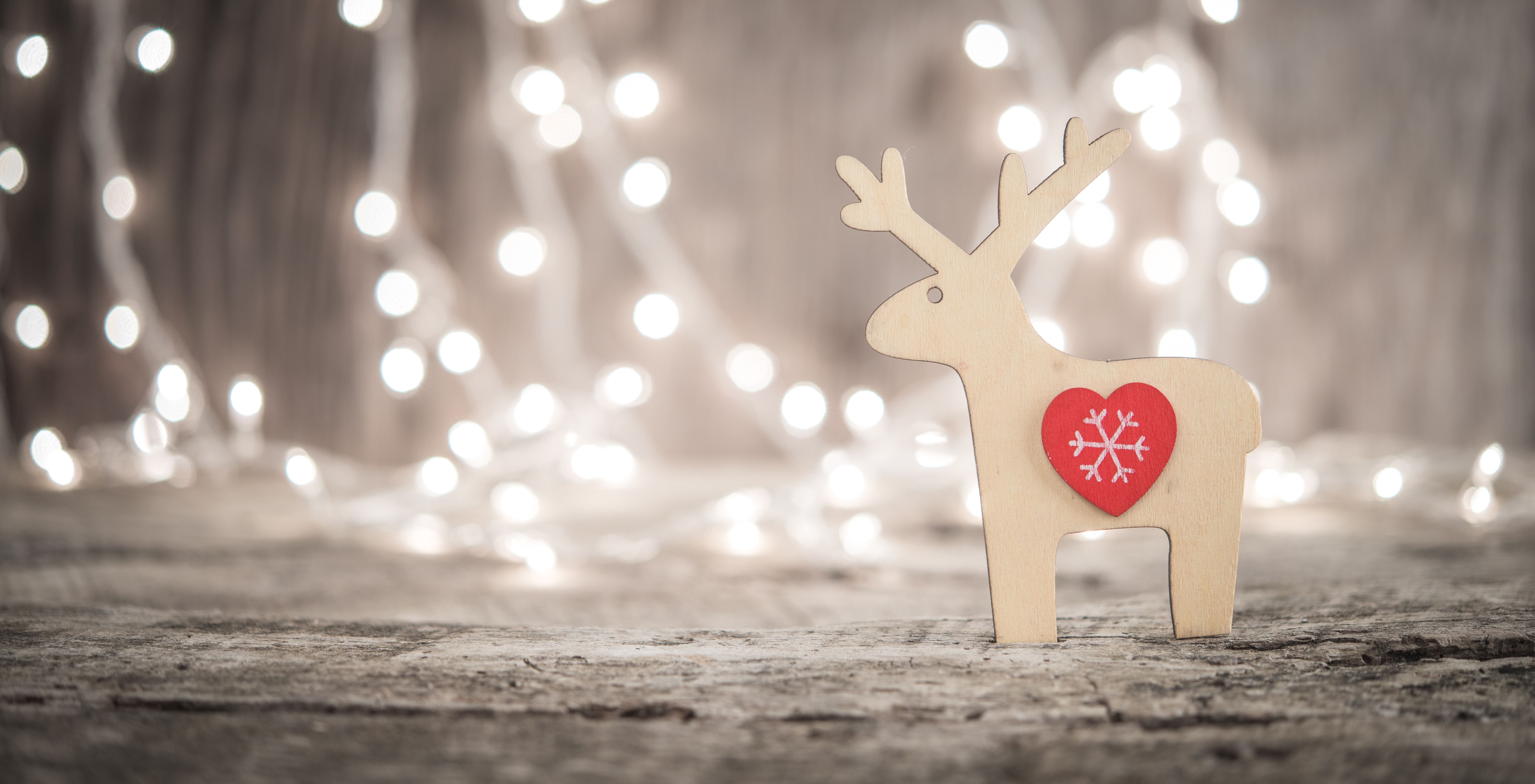 Raindeer ornament and bokeh lights during the Christmas season. | Source: Shutterstock