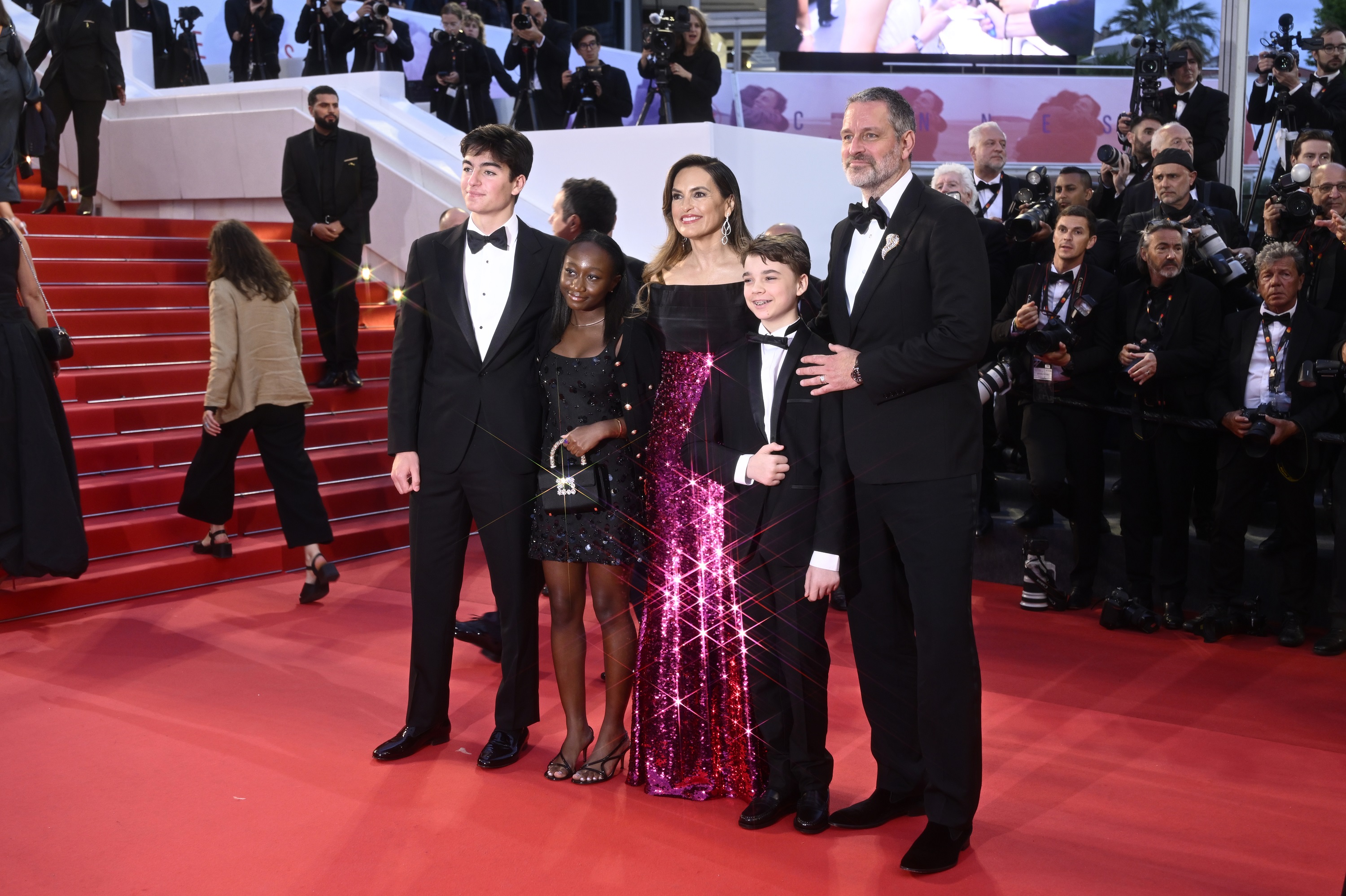 Mariska Hargitay, director of "My Mom Jayne," walked the red carpet at the 78th Cannes Film Festival on May 17, 2025, at the Palais des Festivals in France. She was joined by her husband Peter Hermann and their children August, Amaya, and Andrew.
