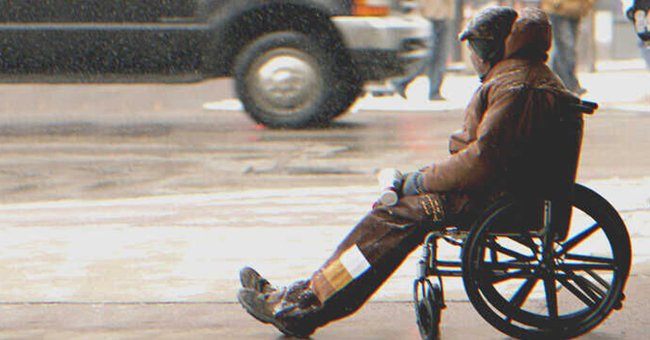 A man in a wheelchair on the street | Source: Shutterstock