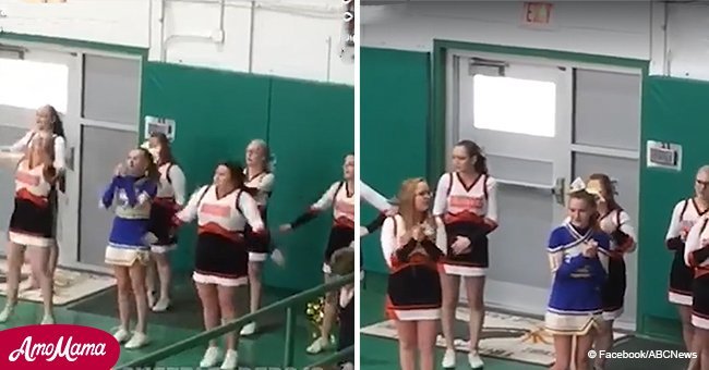 Cheerleaders surprised the crowd when they approached a rival cheerleader caught on her own