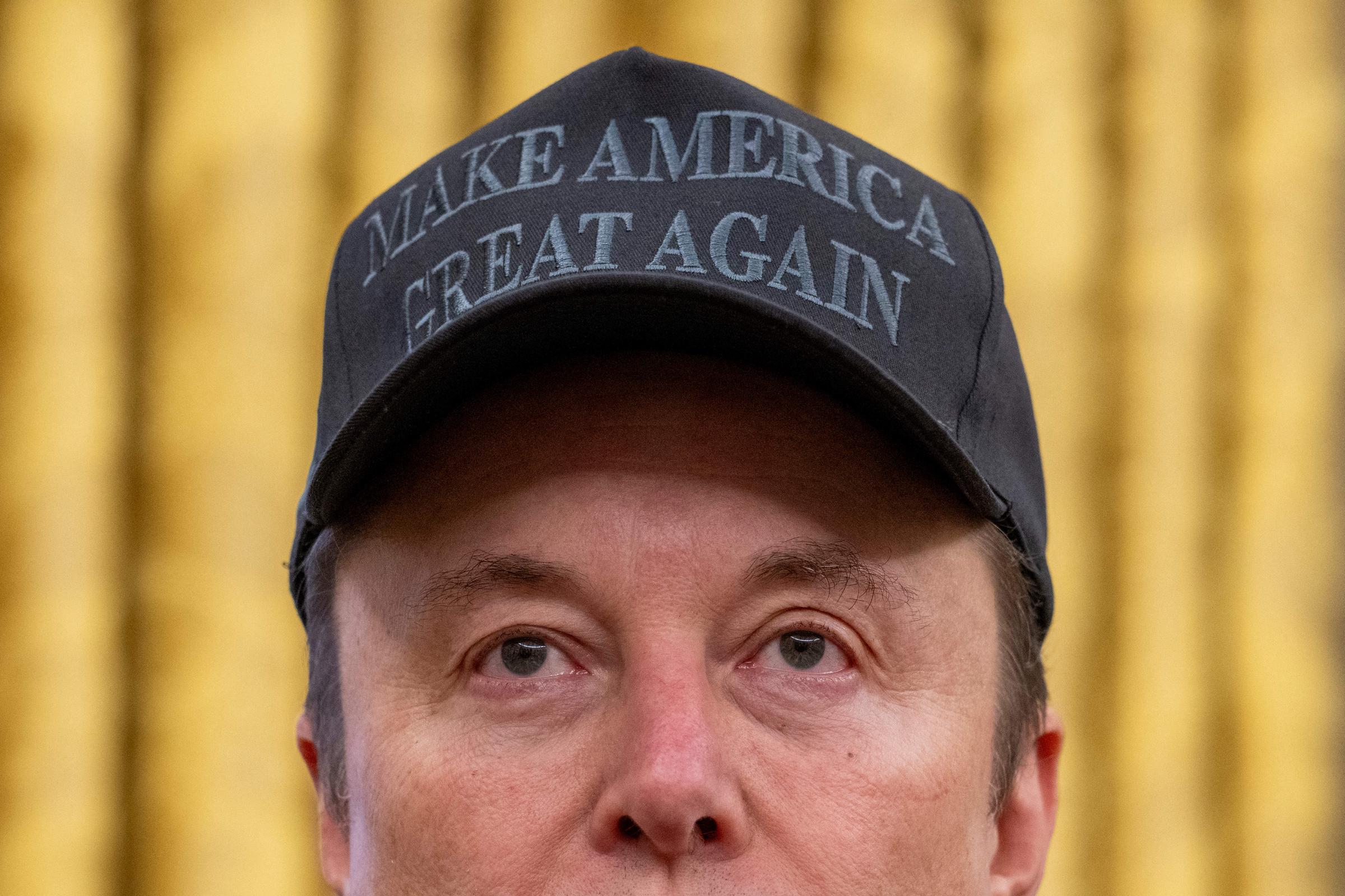 Elon Musk joins U.S. President Donald Trump during an executive order signing in the Oval Office at the White House in Washington, DC, on February 11, 2025 | Source: Getty Images