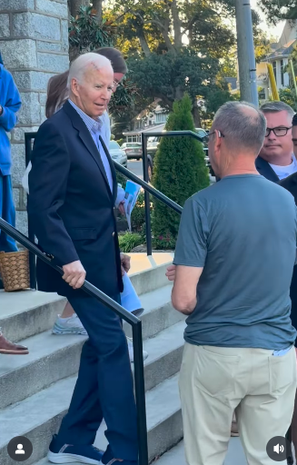 Joe Biden smiling at people gathered outside the church. | Source: Instagramfredkargar