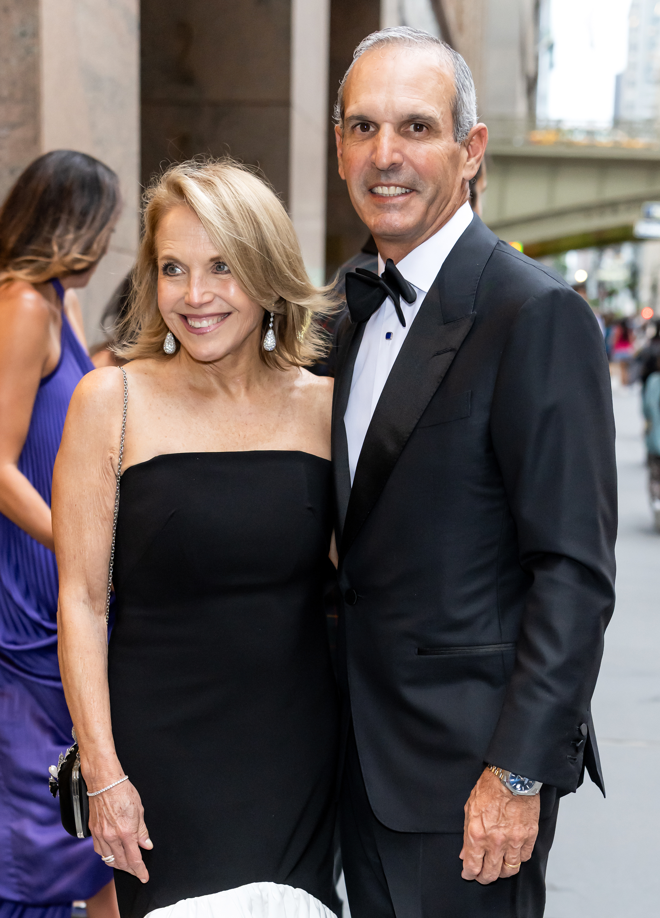 Katie Couric and her husband, John Molner, pose together at a formal event, a far calmer moment than the health scare during which Molner noticed she seemed “weak and dizzy” and helped get her medical attention. | Source: Getty Images