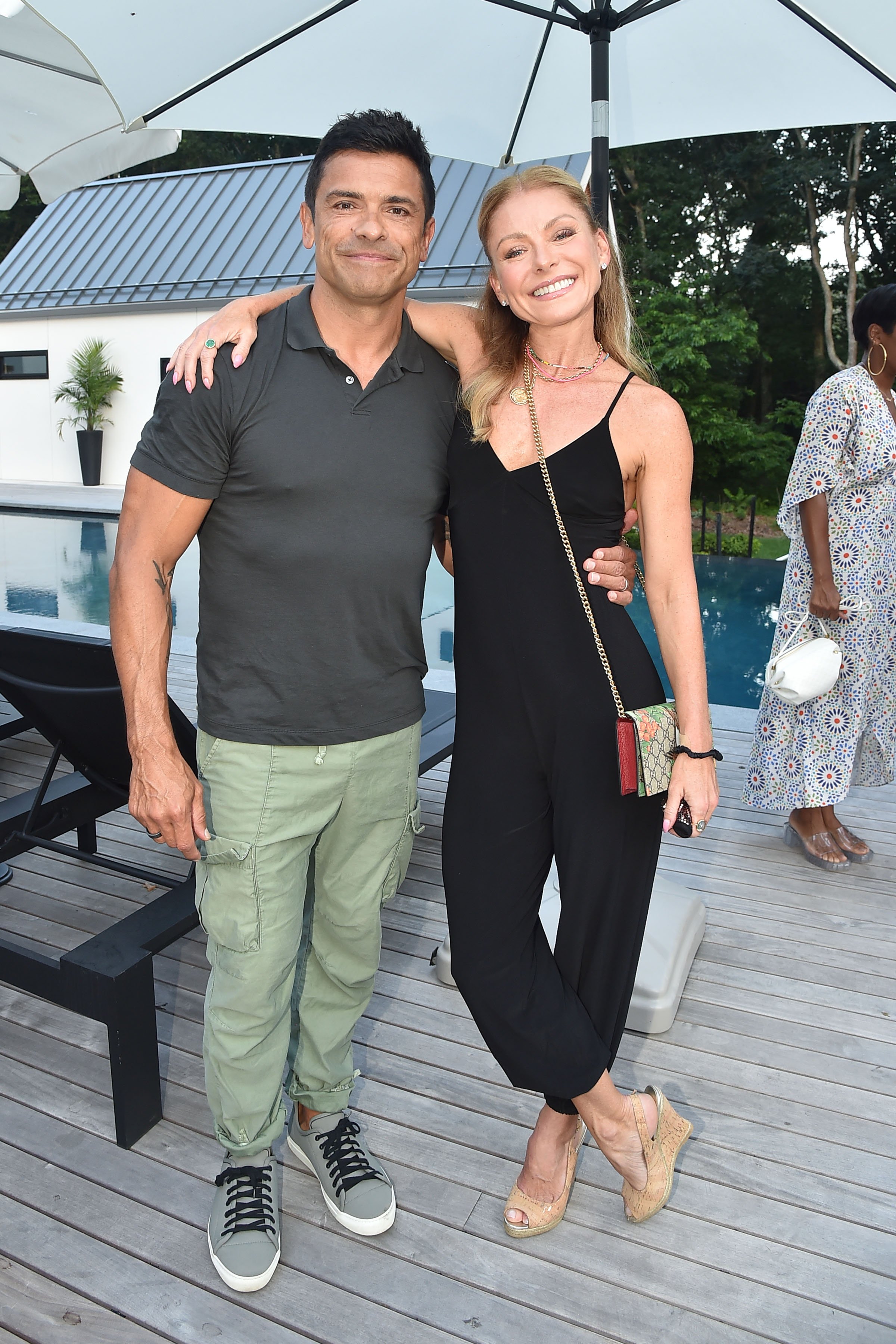 Mark Consuelos and Kelly Ripa at the Launch Of Yoga Pant Nation By Laurie Gelman in Water Mill, New York City | Photo: Patrick McMullan via Getty Images