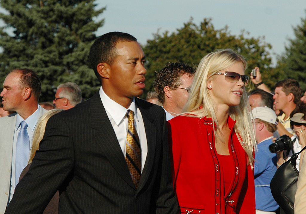 Tiger Woods and Elin Nordegren leave the stage after opening ceremonies at the 2004 Ryder Cup in Detroit, Michigan, September 16, 2004. | Source: Getty Images