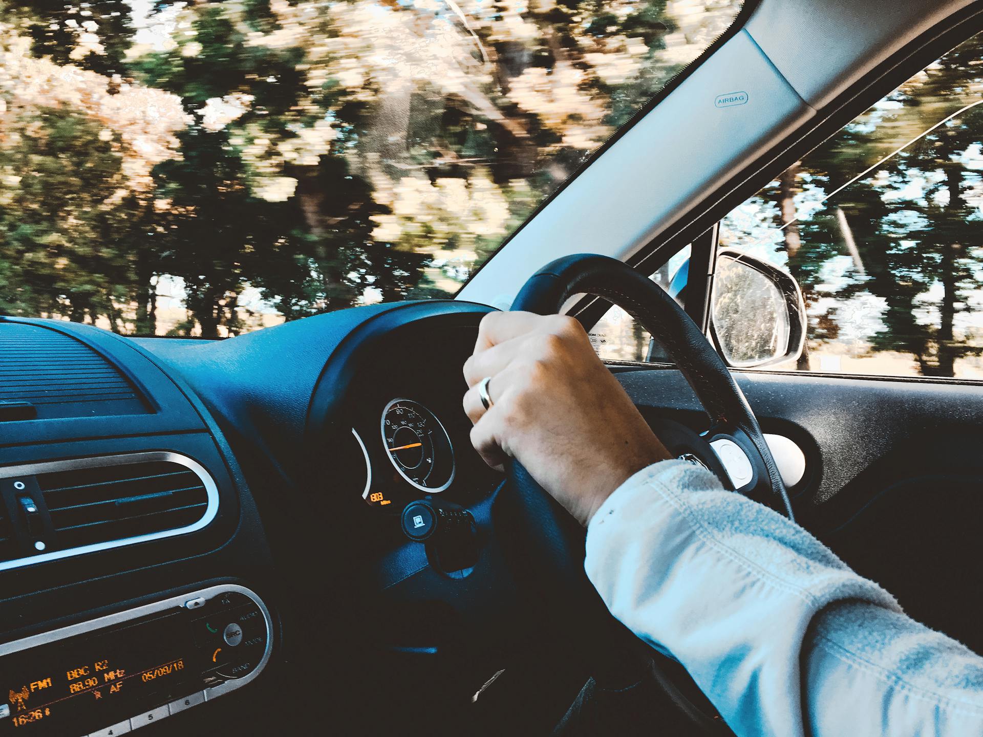 A person driving a car | Source: Pexels