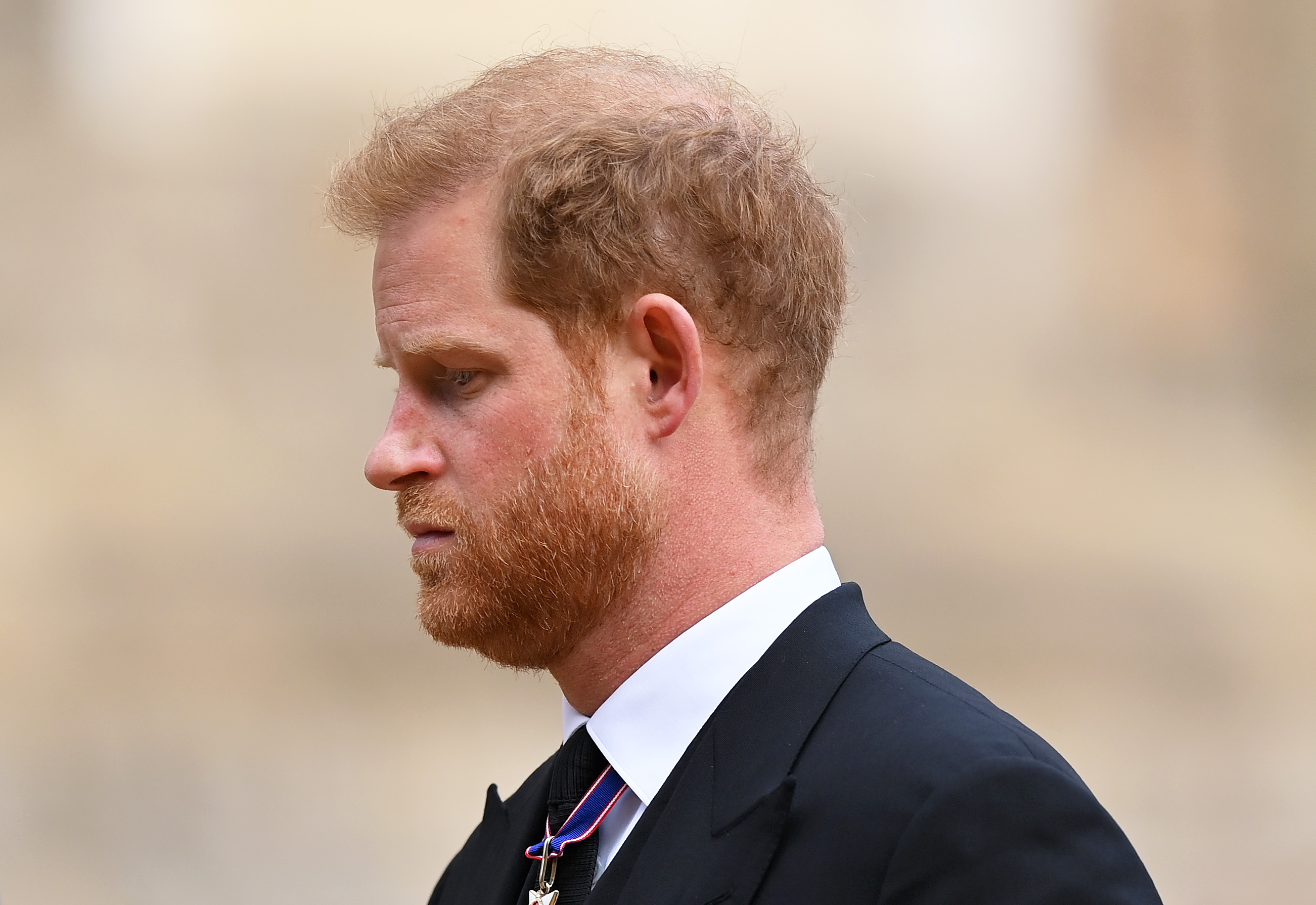 Prince Harry as he joined the Procession following the State Hearse carrying the coffin of Queen Elizabeth II towards St George's Chapel on September 19, 2022 | Source: Getty Images