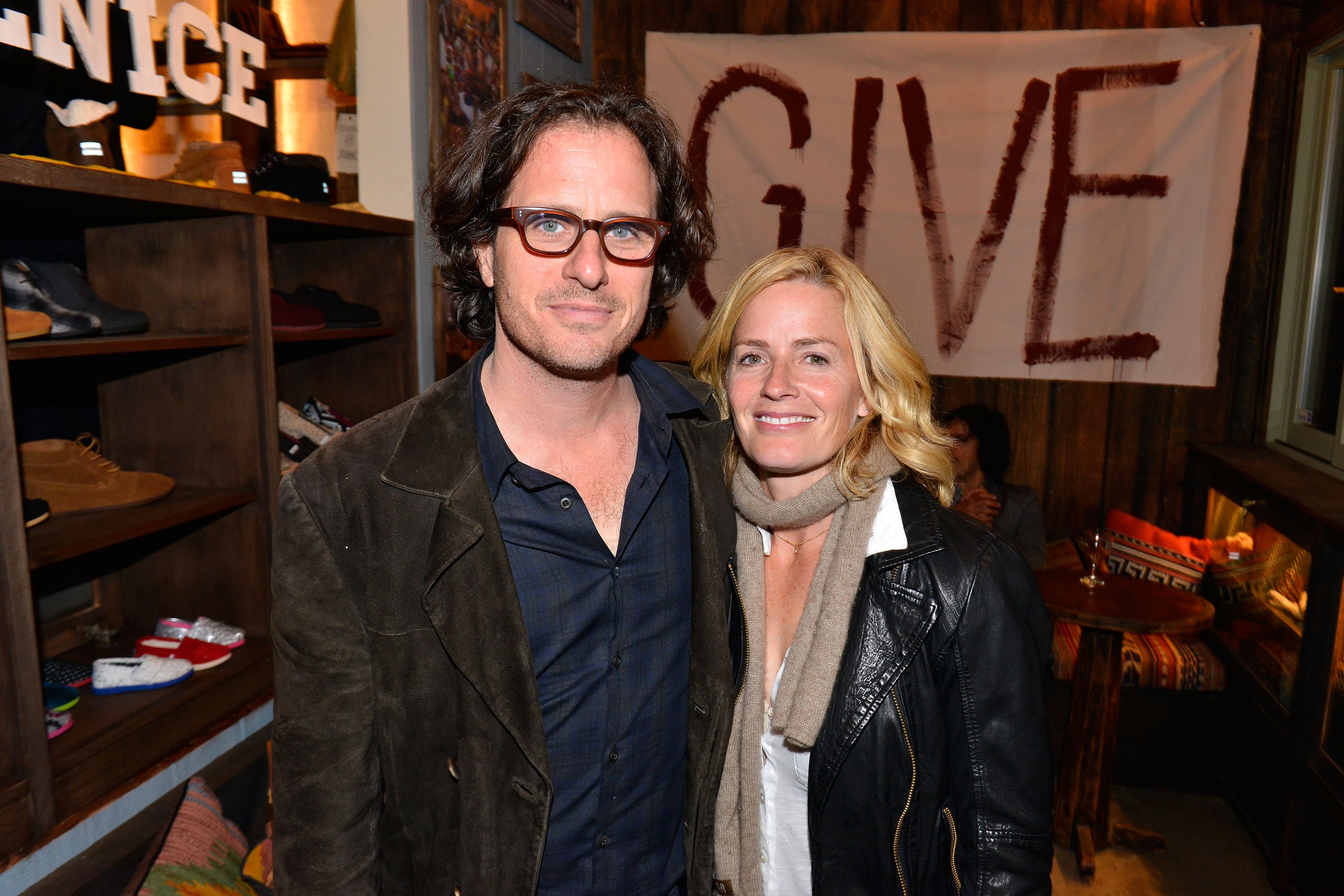 Davis Guggenheim and actress Elisabeth Shue attend the Grand Opening of TOMS official flagship store on December 17, 2012, in Venice, California. | Source: Getty Images.