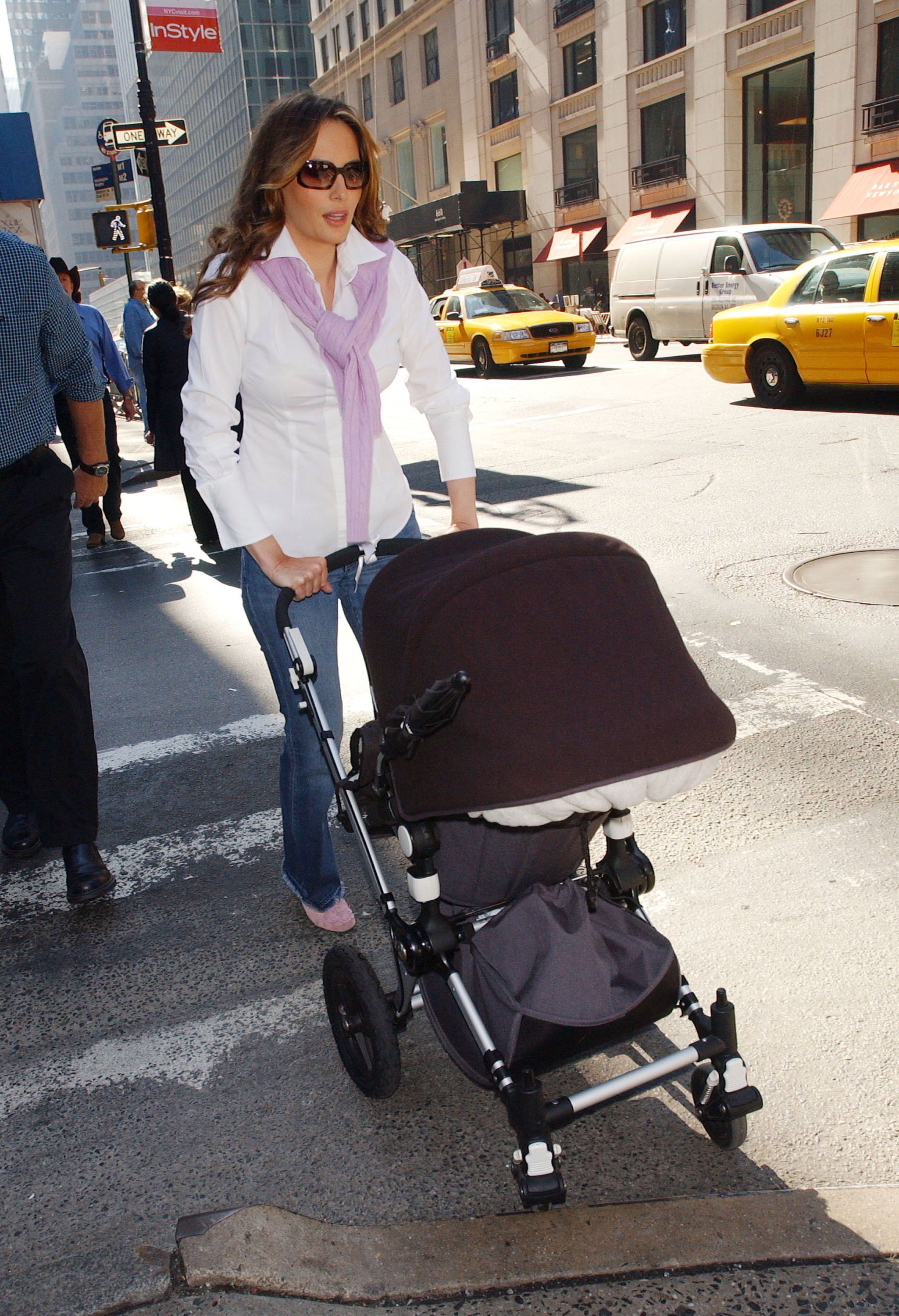 Melania Trump pushes Barron Trump in a baby carriage on October 9, 2006, in New York City. | Source: Getty Images
