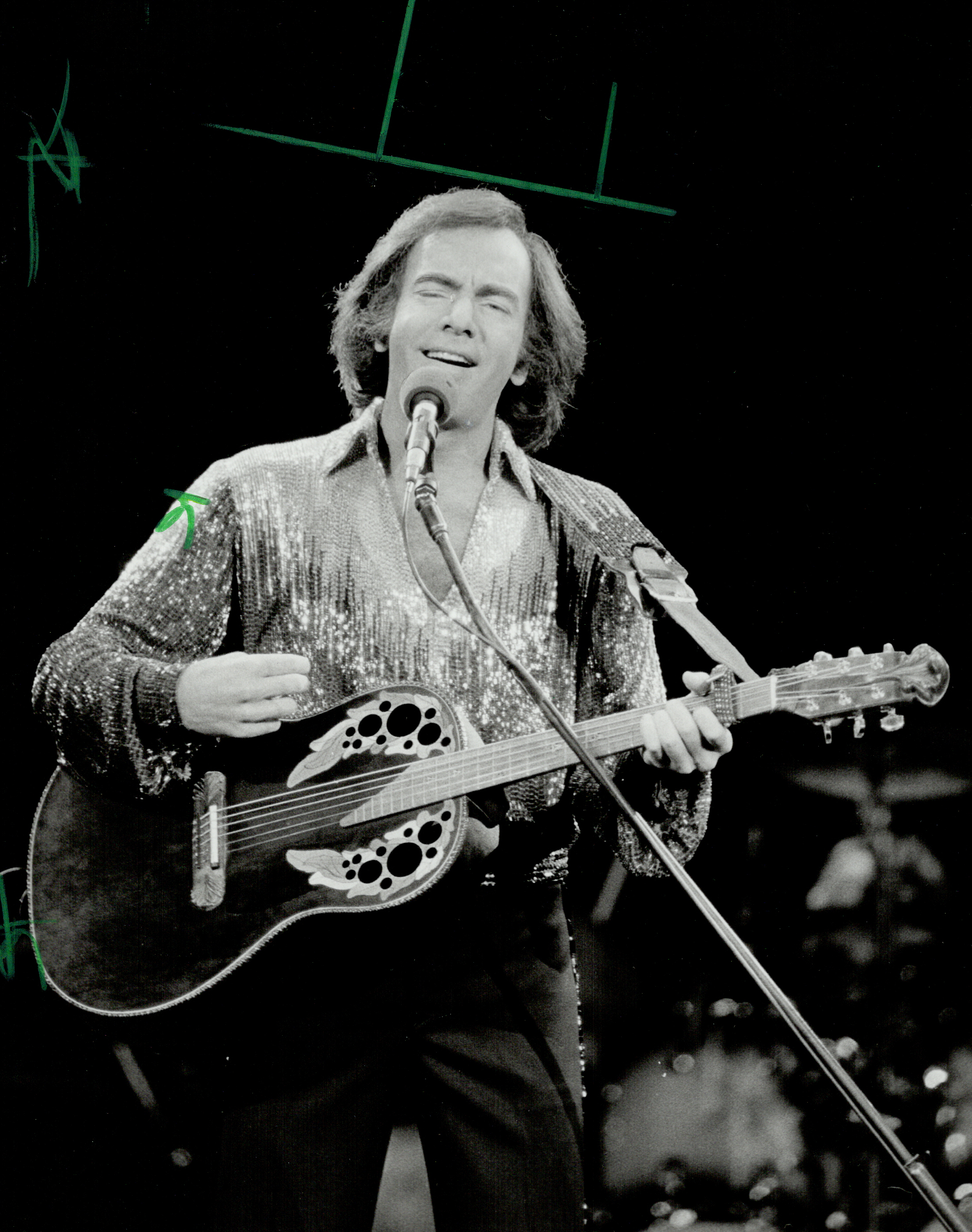 The "Cherry, Cherry" singer performing live in 1982. | Source: Getty Images