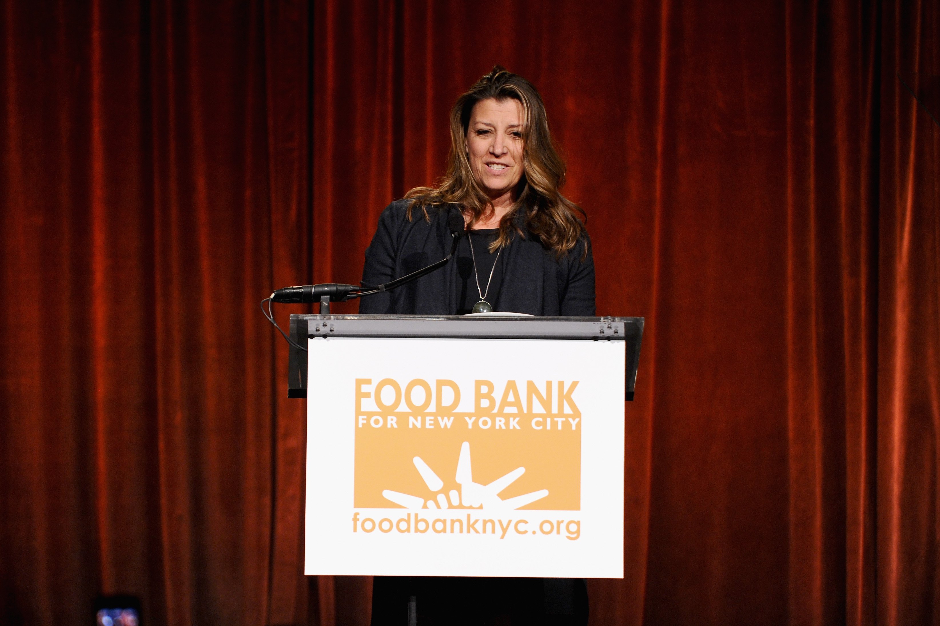 Dorothea Hurley is pictured speaking on stage at the Food Bank for New York City's Can Do awards dinner gala on April 9, 2014, in New York City | Source: Getty Images