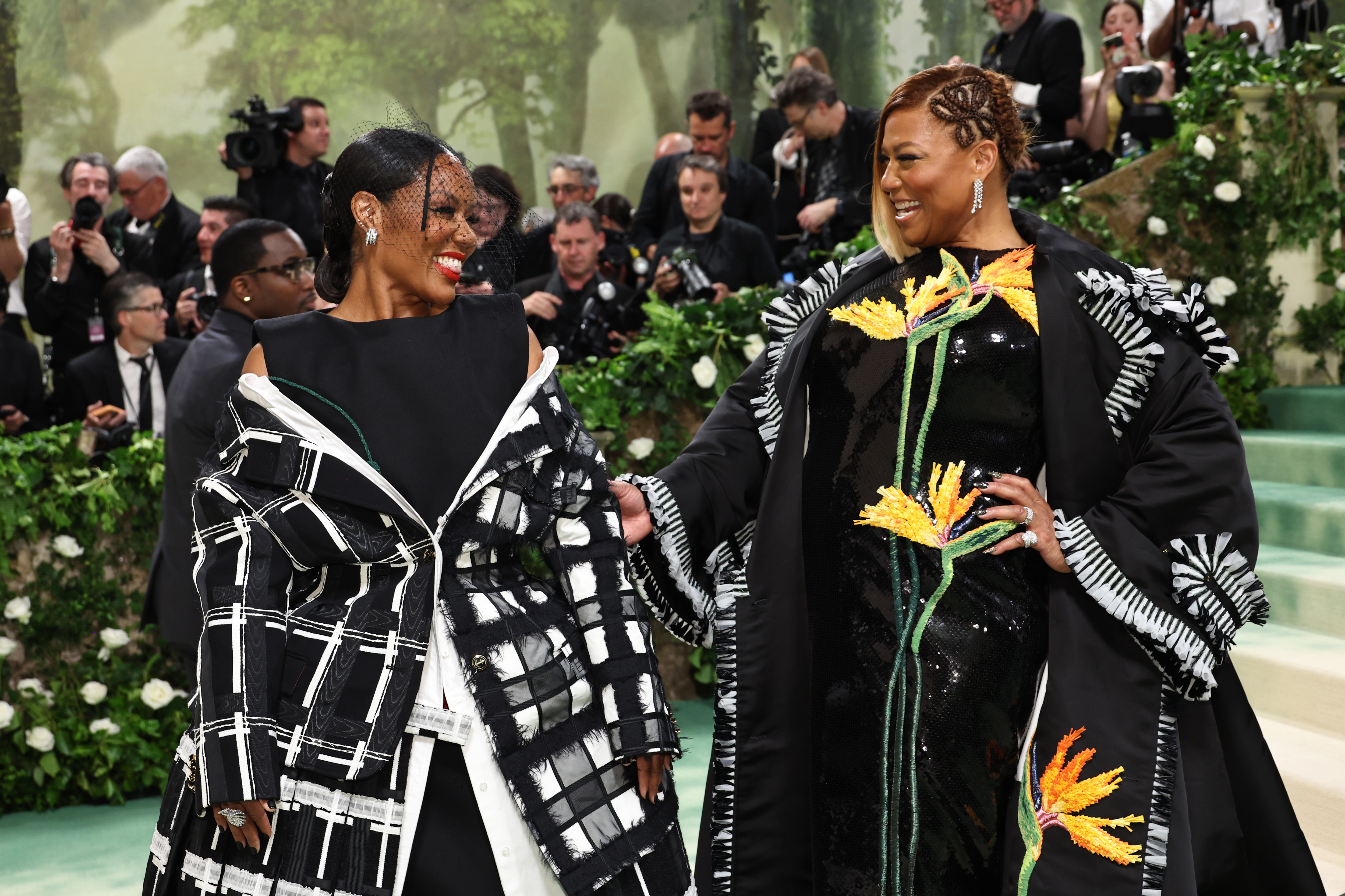 Eboni Nichols and Queen Latifah at the Met Gala Celebrating "Sleeping Beauties: Reawakening Fashion" in New York City on May 6, 2024. | Source: Getty Images