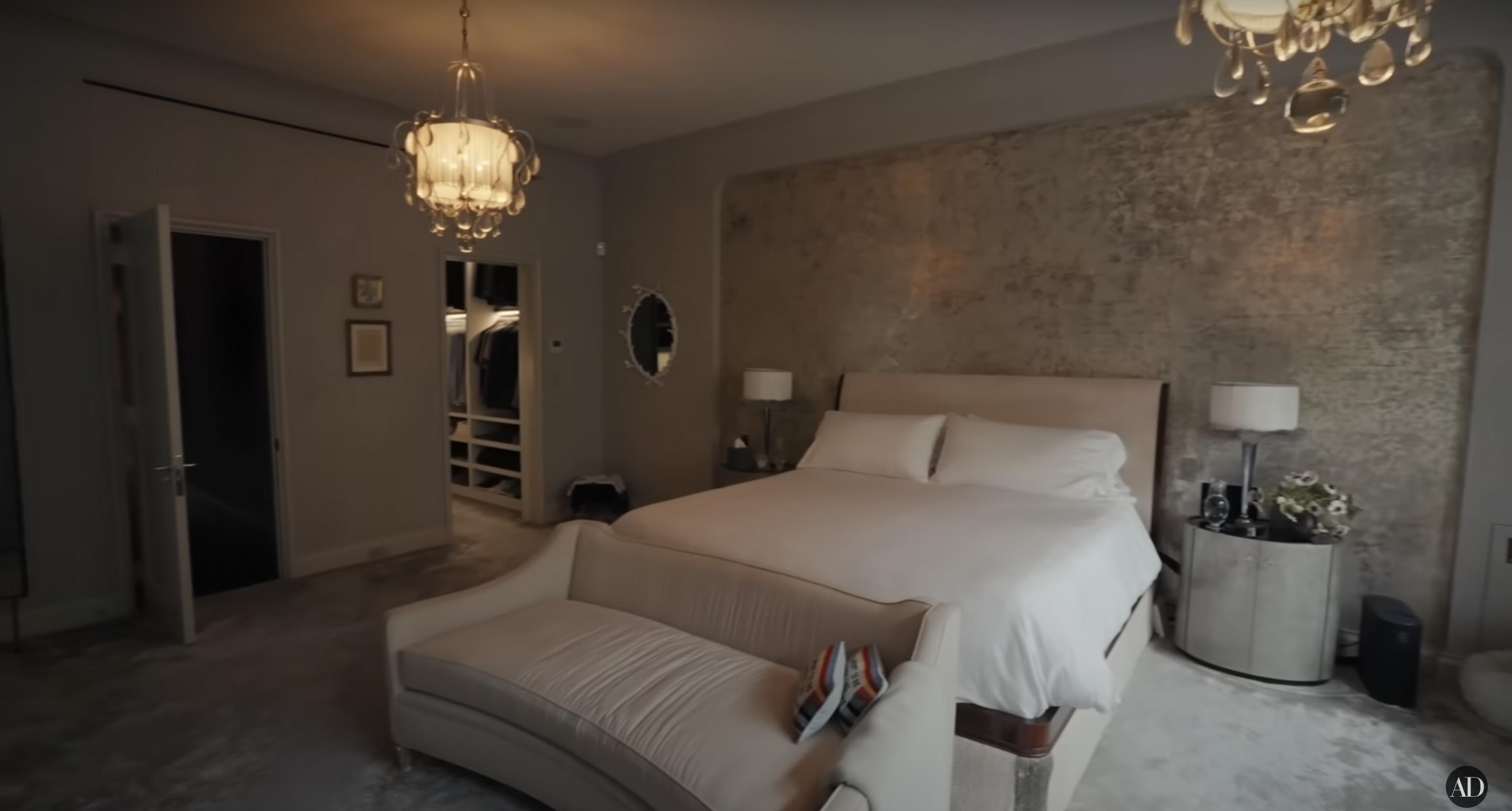 Kelly Ripa and Mark Consuelos' bedroom inside their New York townhouse, dated December 10, 2024 | Source: YouTube/@Archdigest