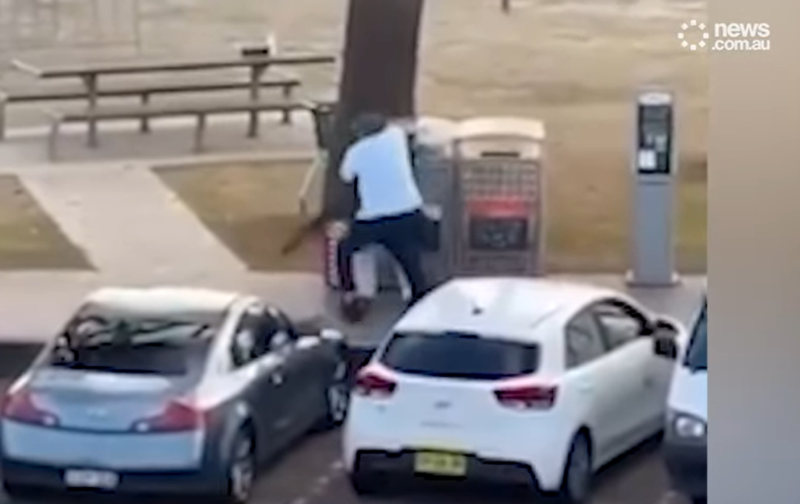 A bystander tackles a gunman during the Bondi Beach attack, as captured on video | Source: YouTube/newscomauhq