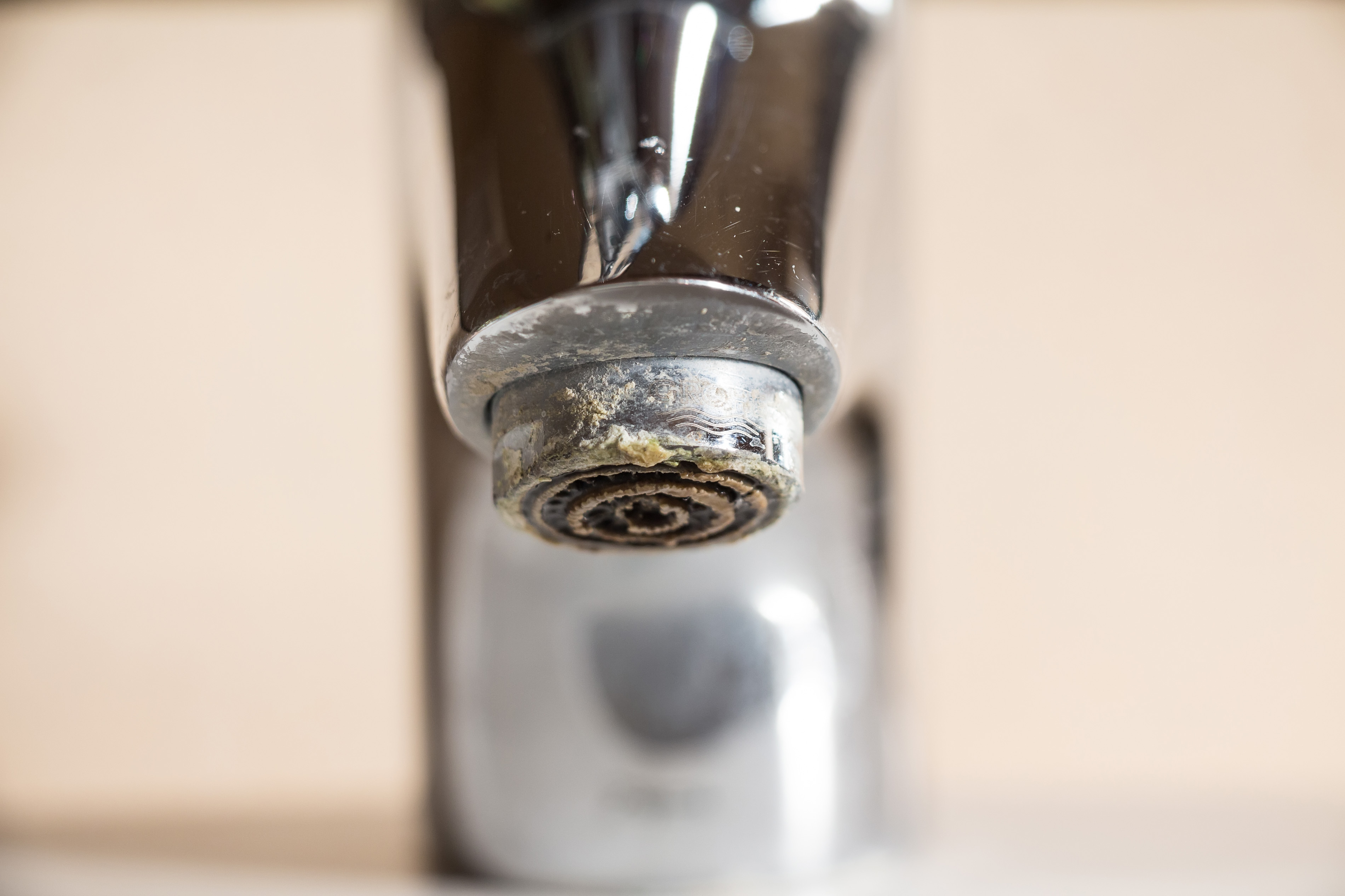 Hard water deposit on tap | Source: Shutterstock