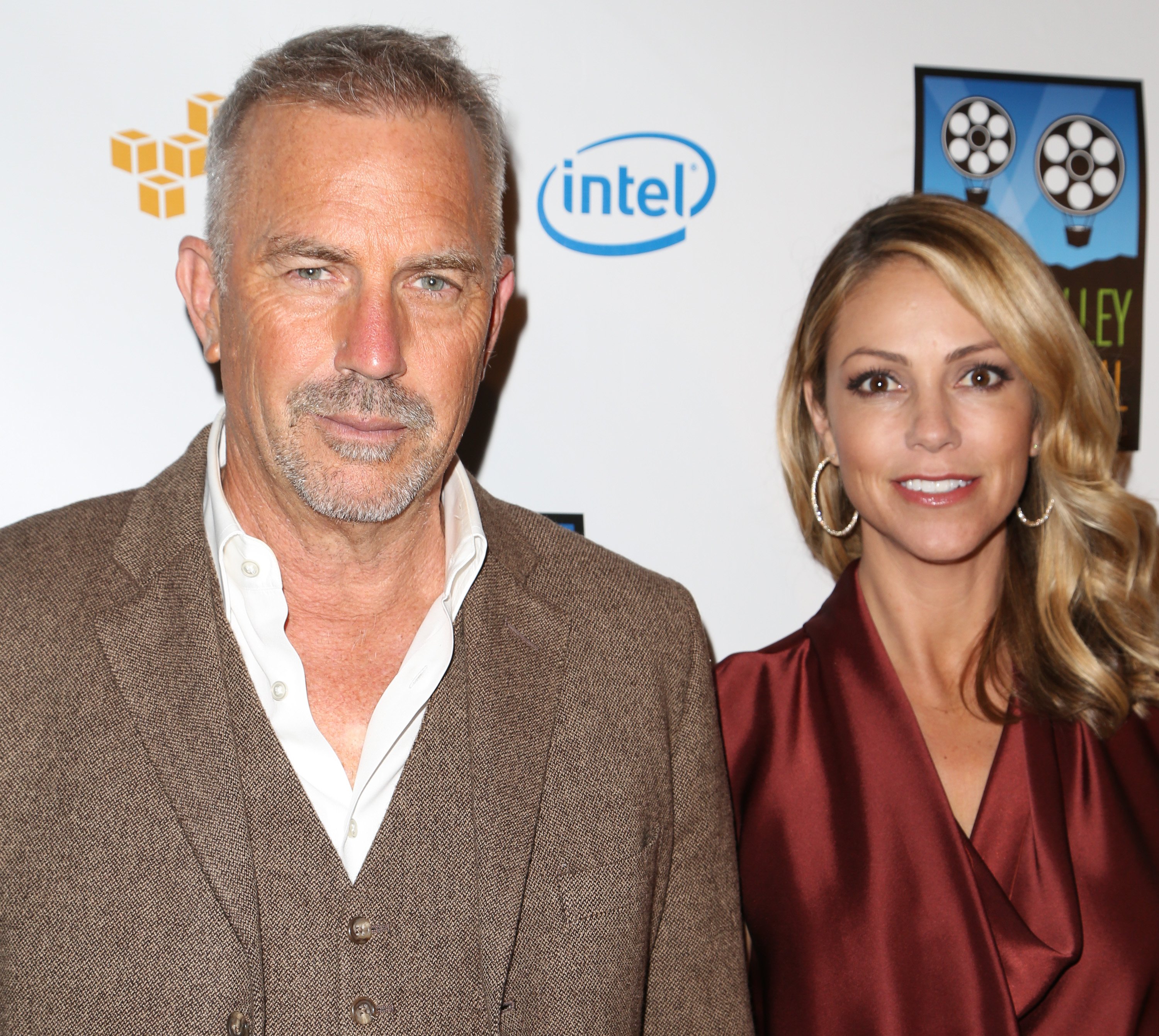 Kevin Costner and wife Christine Baumgartner attend the Mercedes-Benz arrivals at the Napa Valley Film Festival Gala on November 13, 2014, in Napa, California. | Source: Getty Images