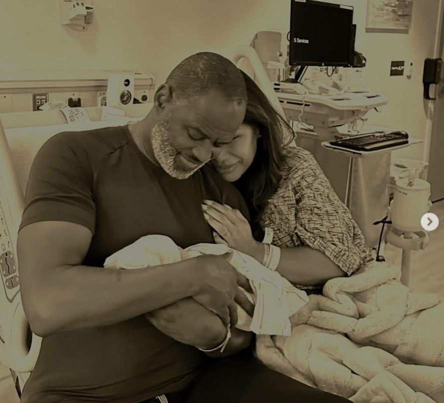 Brian McKnight and Leilani McPhee cuddle their son, baby Brian, from a post dated June 19, 2023. | Source: Instagram/leilani_211