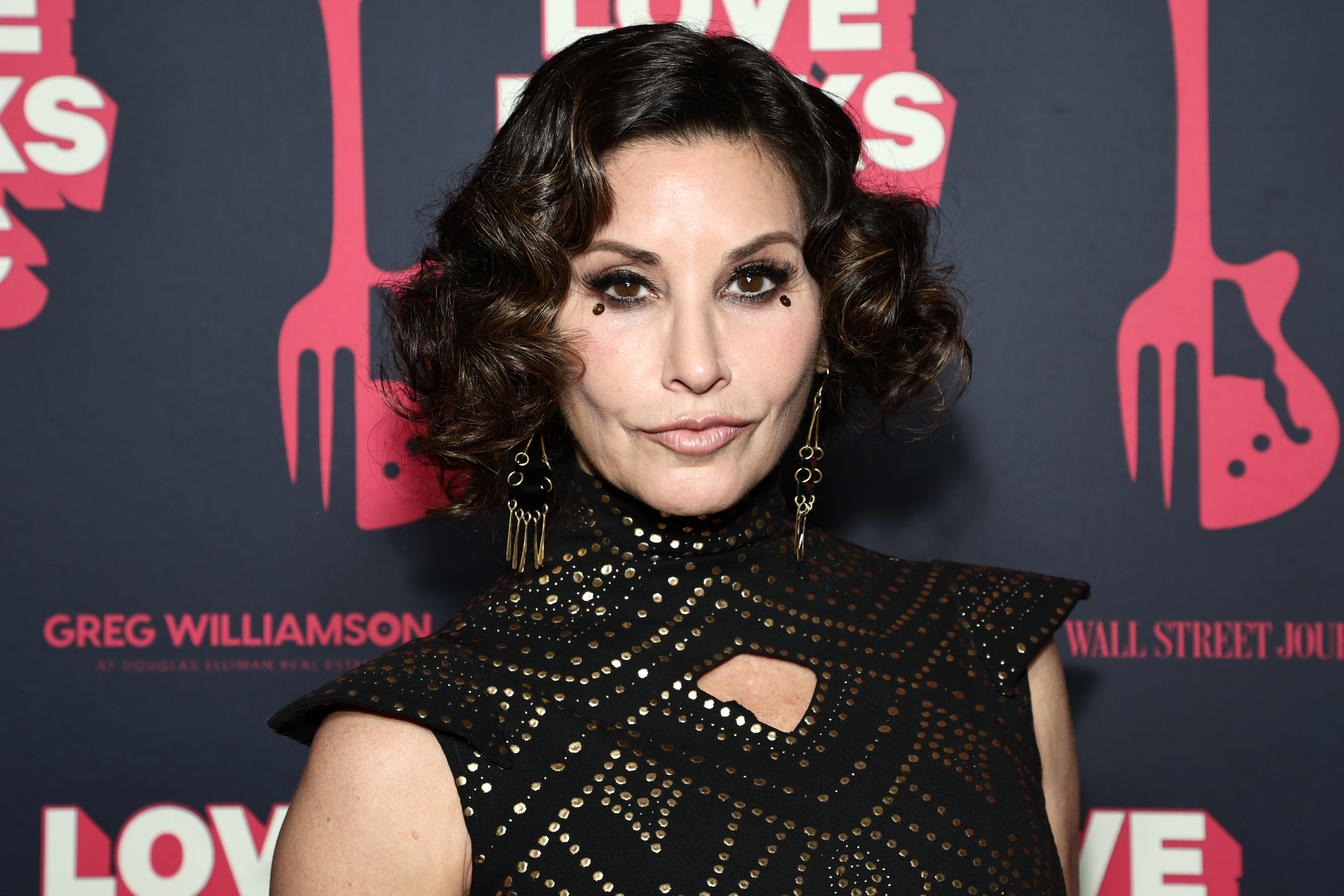 Gina Gershon at the Seventh Annual LOVE ROCKS NYC Benefit Concert for God's Love We Deliver on March 9, 2023, in New York | Source: Getty Images