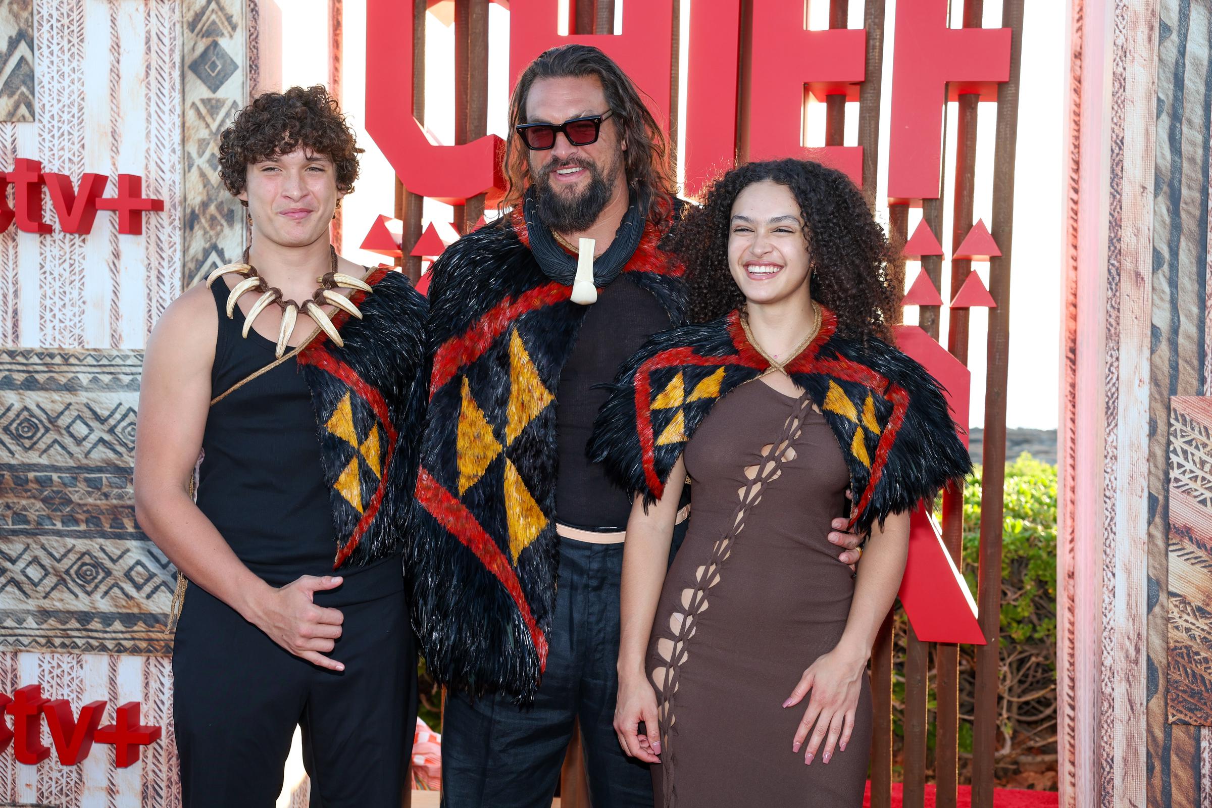 Nakoa-Wolf Momoa, Jason Momoa, and Lola Iolani Momoa seen at the world premiere of the Apple TV+ series “Chief of War” at the Ko Olina Beach Park on July 18, 2025, in Kapolei, Hawaii. | Source: Getty Images