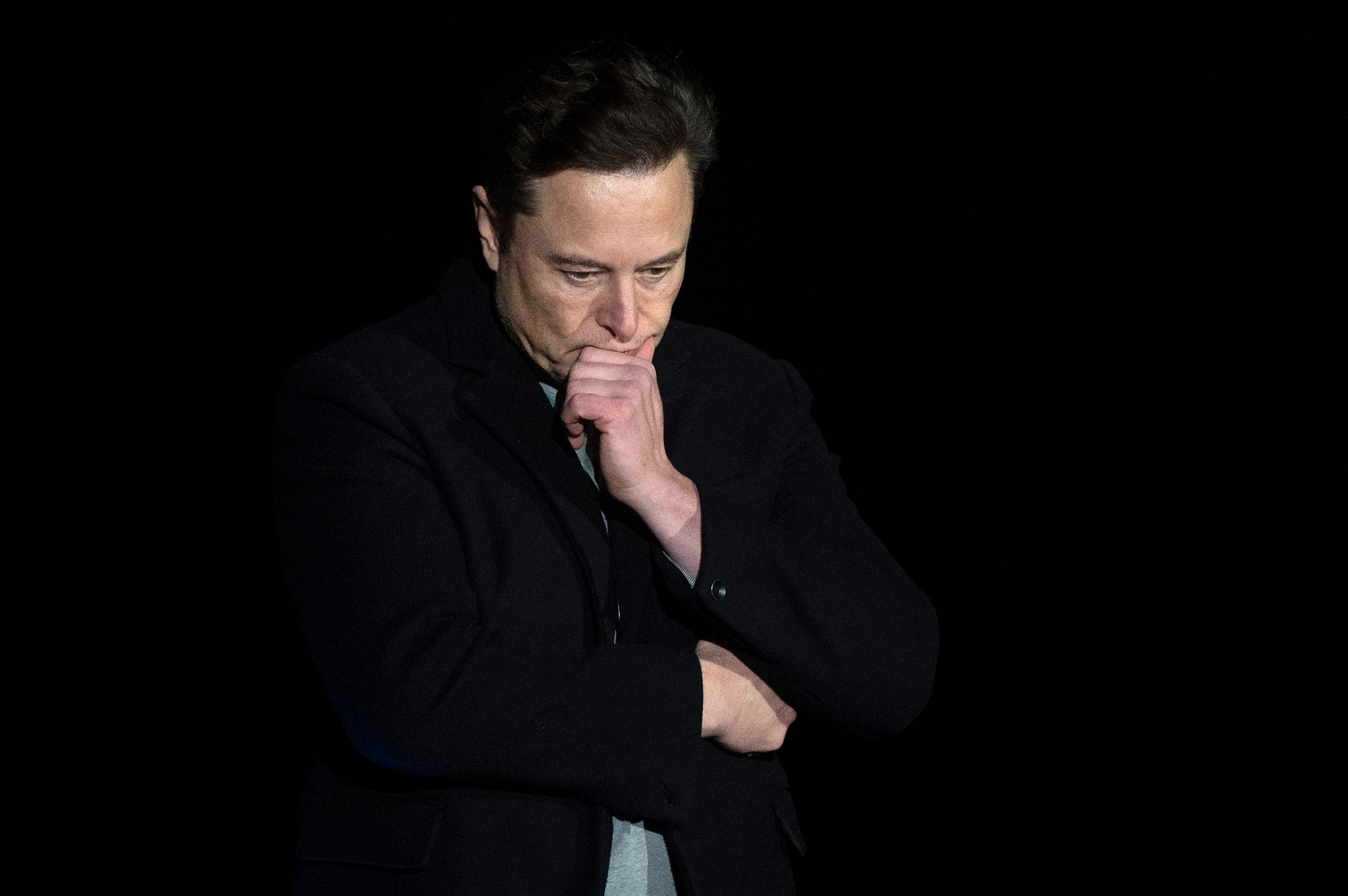 Elon Musk pauses as he speaks during a press conference at SpaceX's Starbase facility near Boca Chica Village in South Texas on February 10, 2022. | Source: Getty Images