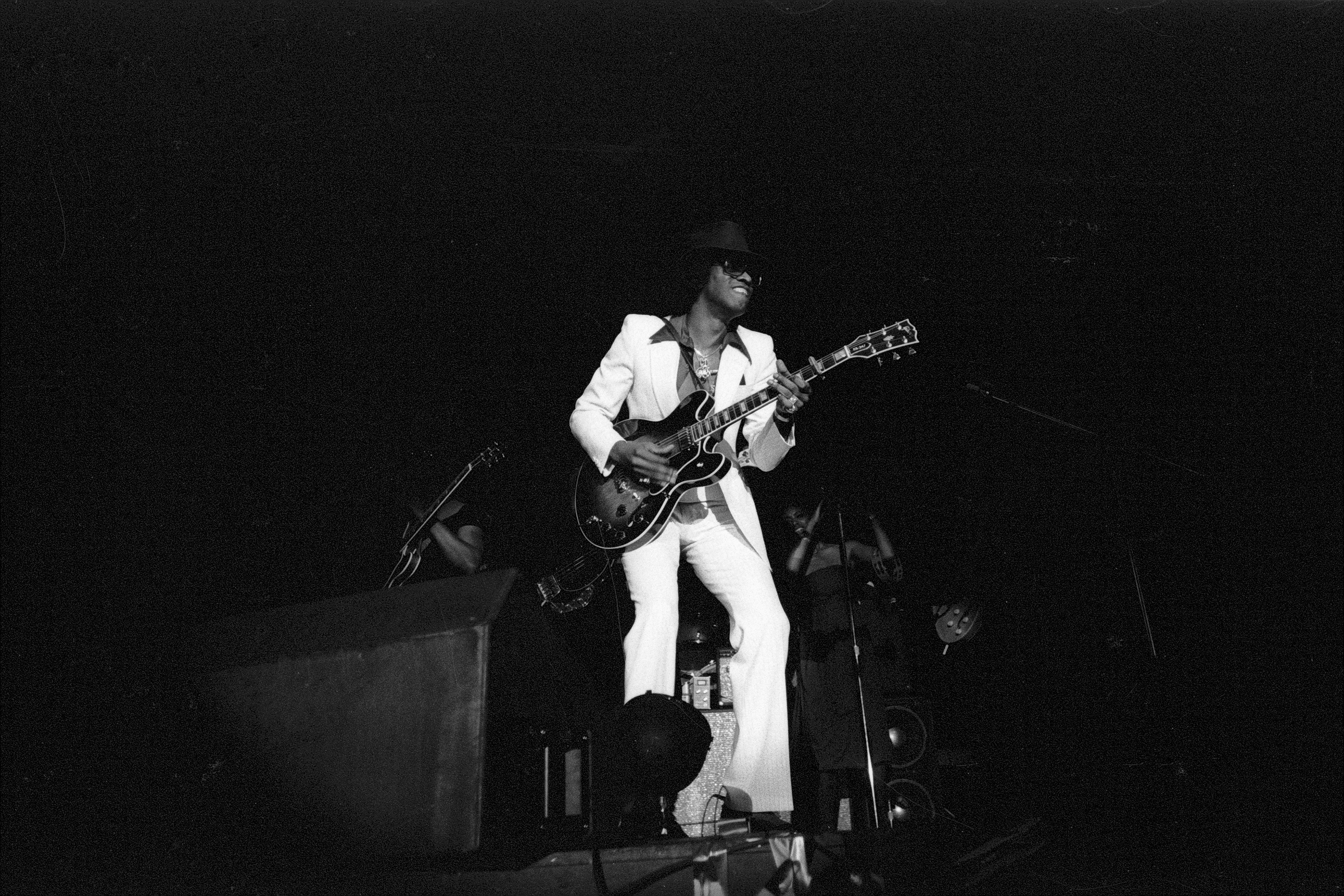 Johnny "Guitar "Watson, American blues, soul, and funk musician and singer-songwriter on stage in Berlin in June 1980 | Source: Getty Images