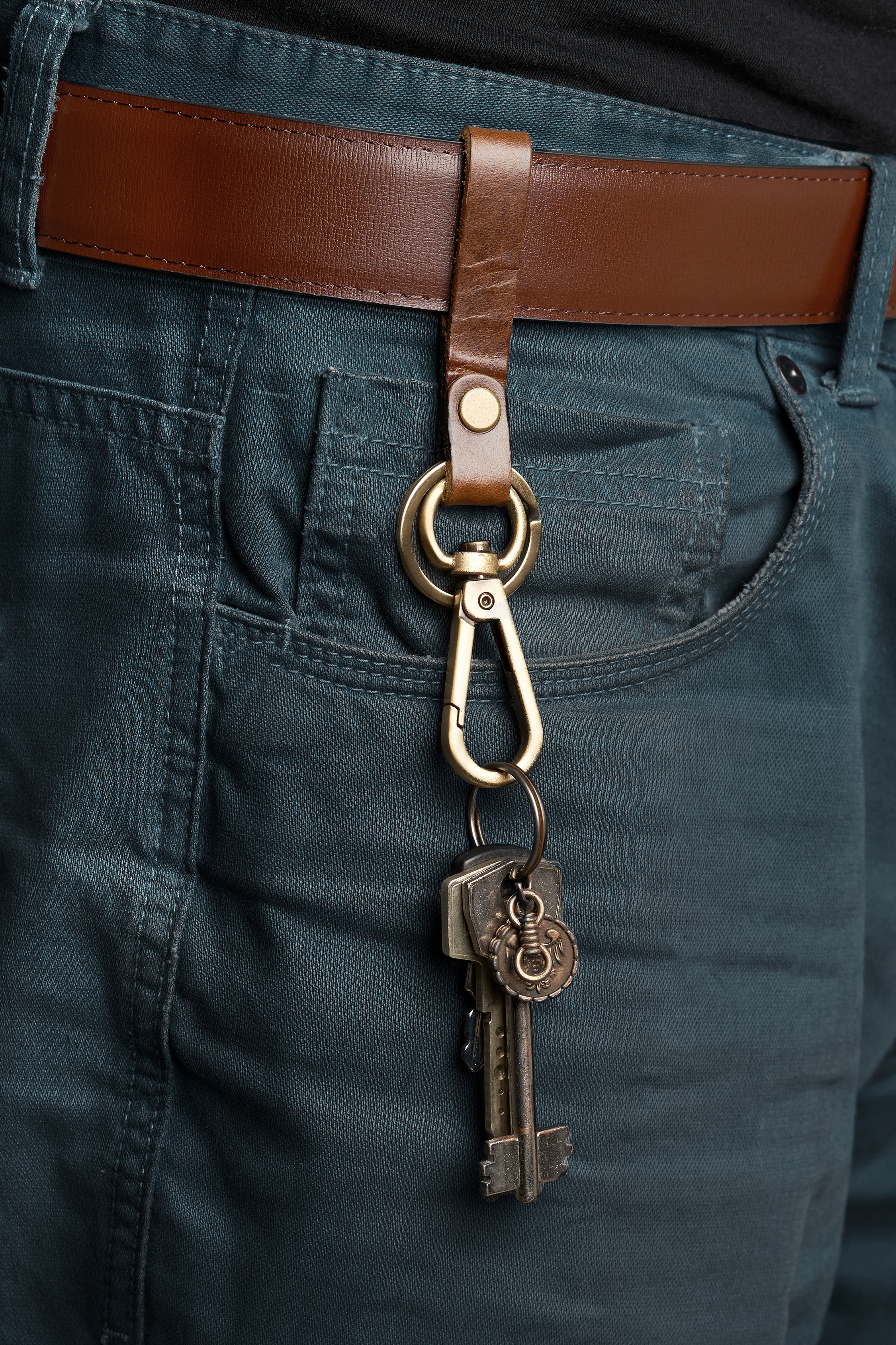 Stylish keychain with brown leather belt | Source: Shutterstock.com
