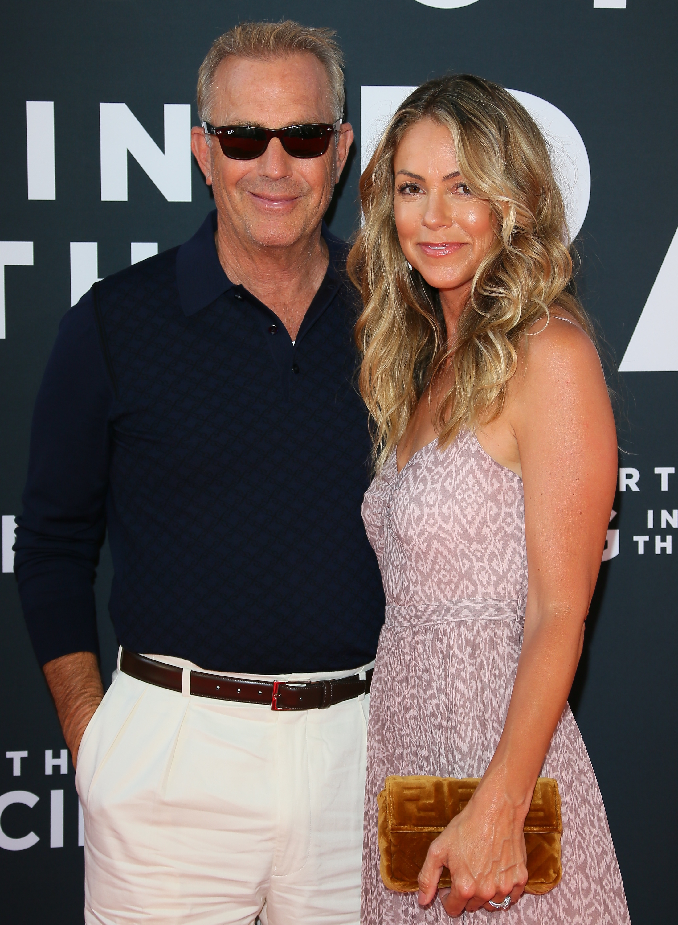 Kevin Costner and Christine Baumgartner in Los Angeles on August 1, 2019 | Source: Getty Images