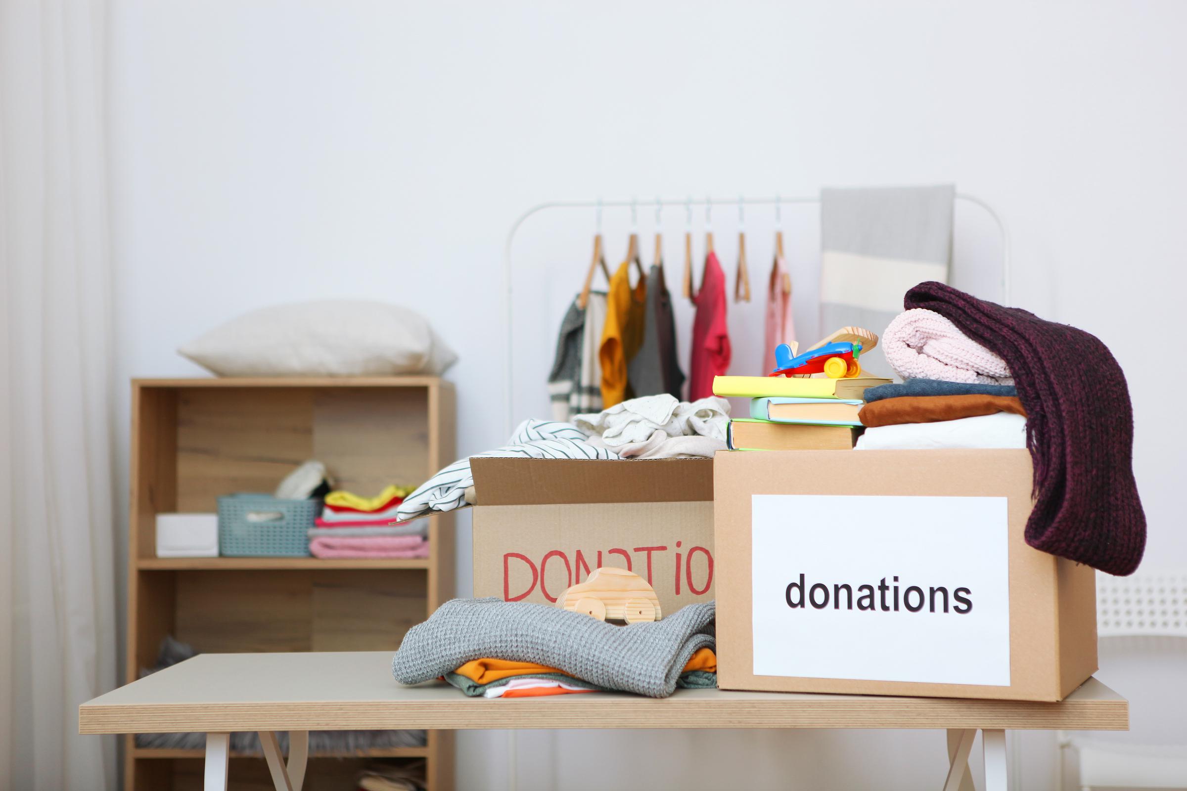 Donation boxes on a table | Source: Shutterstock