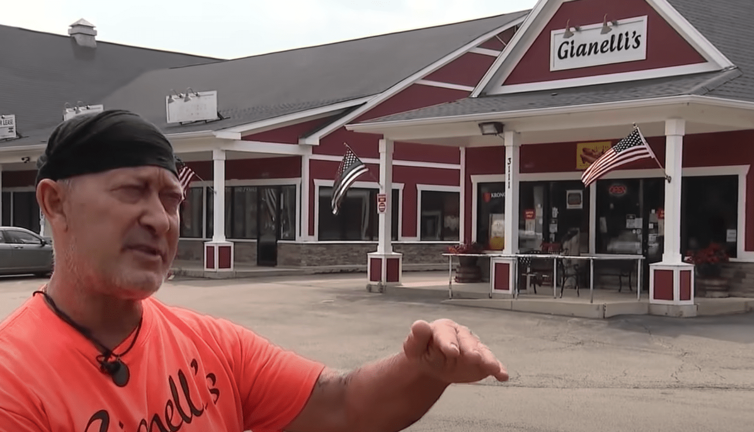 A business owner who received two tickets for flying the American flag explains why he disagrees with the citations | Photo: Youtube/FOX 32 Chicago