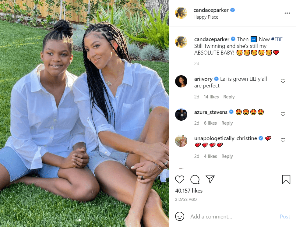 Candace Parker and her daughter Lailaa wearing matching outfits while sitting on the grass | Source: instagram.com/candaceparker