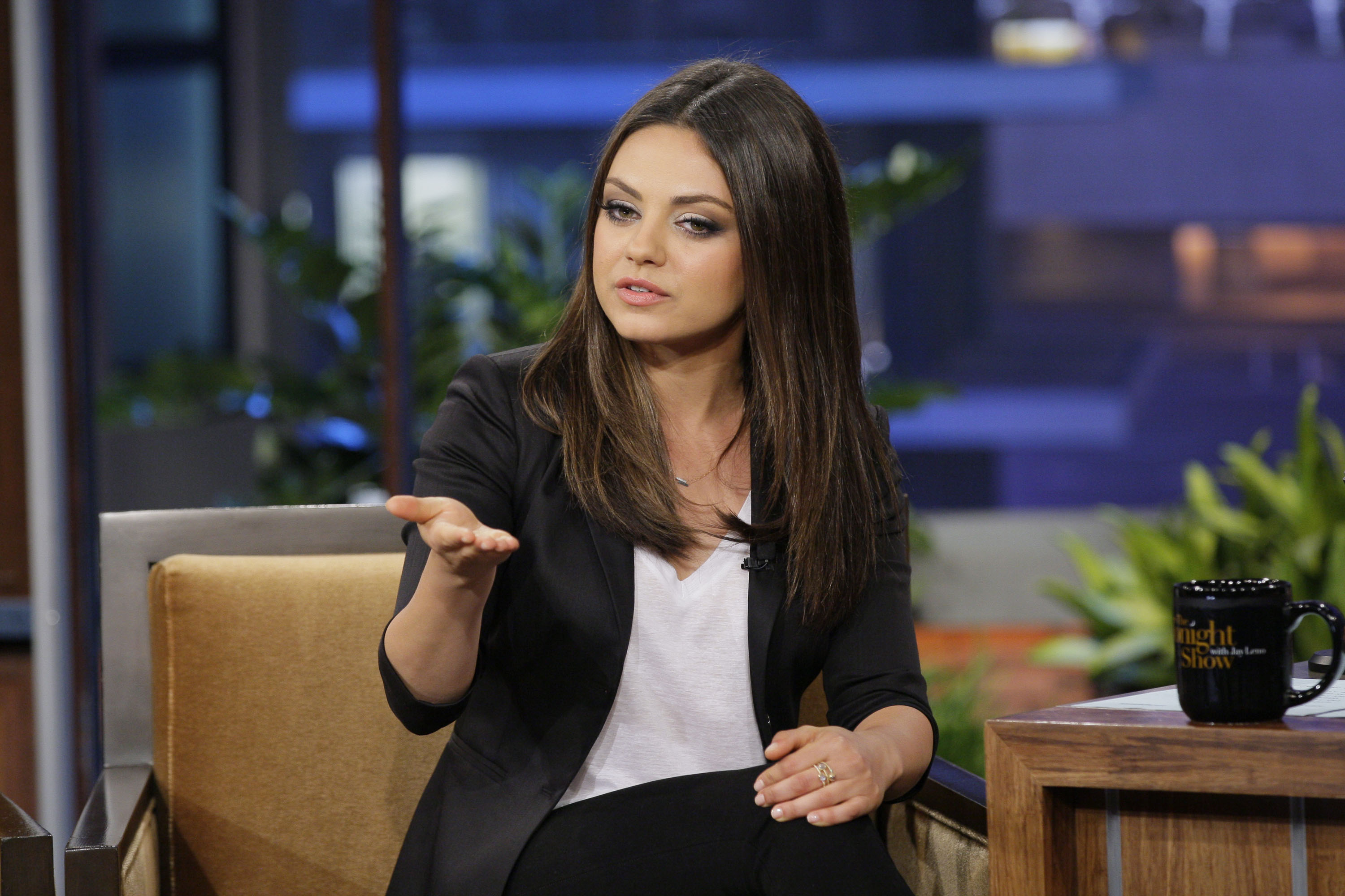 Mila Kunis speaking during an appearance on "The Tonight Show with Jay Leno" on June 27, 2012 | Source: Getty Images