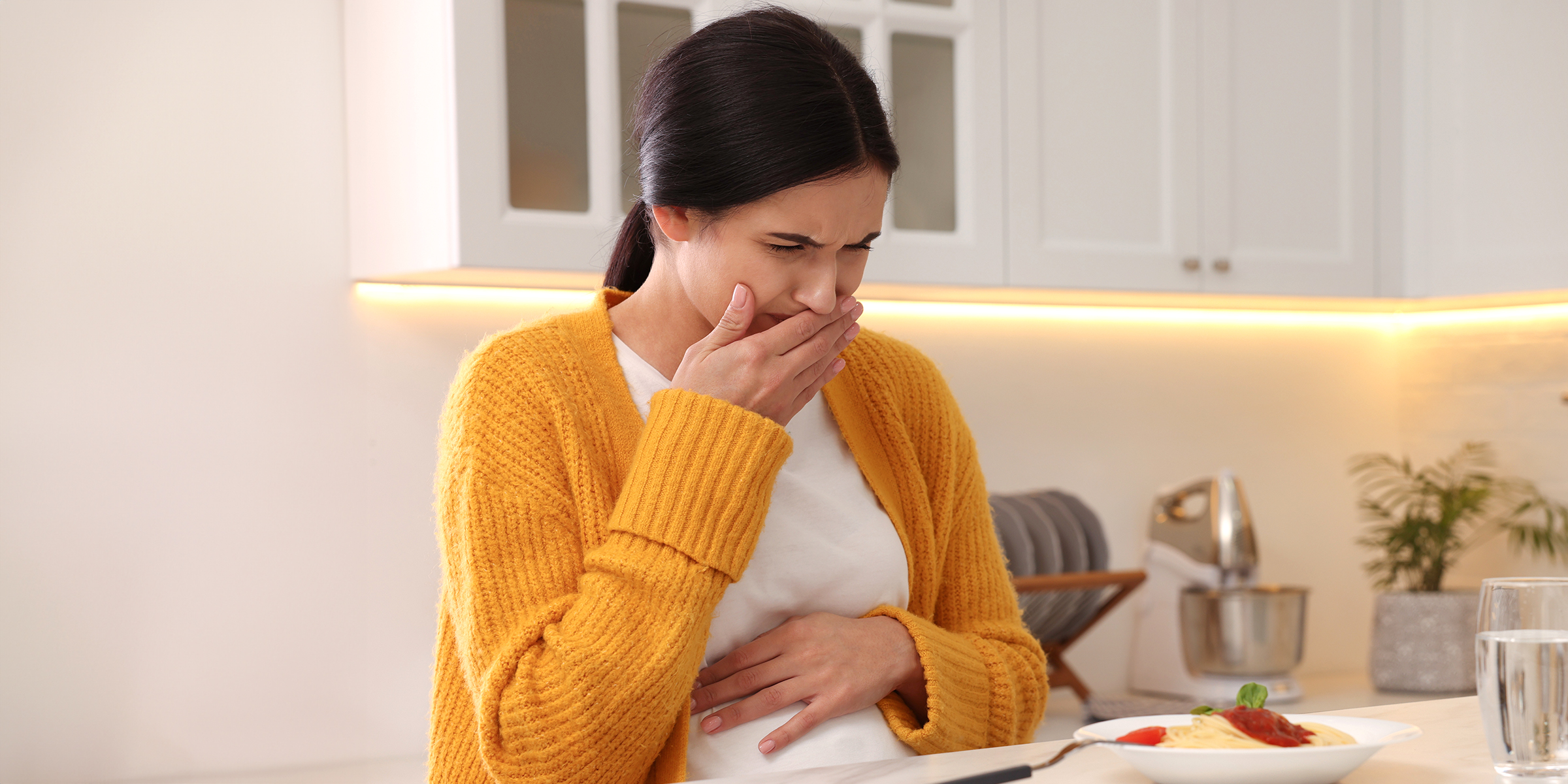 A woman feeling unwell | Source: Shutterstock