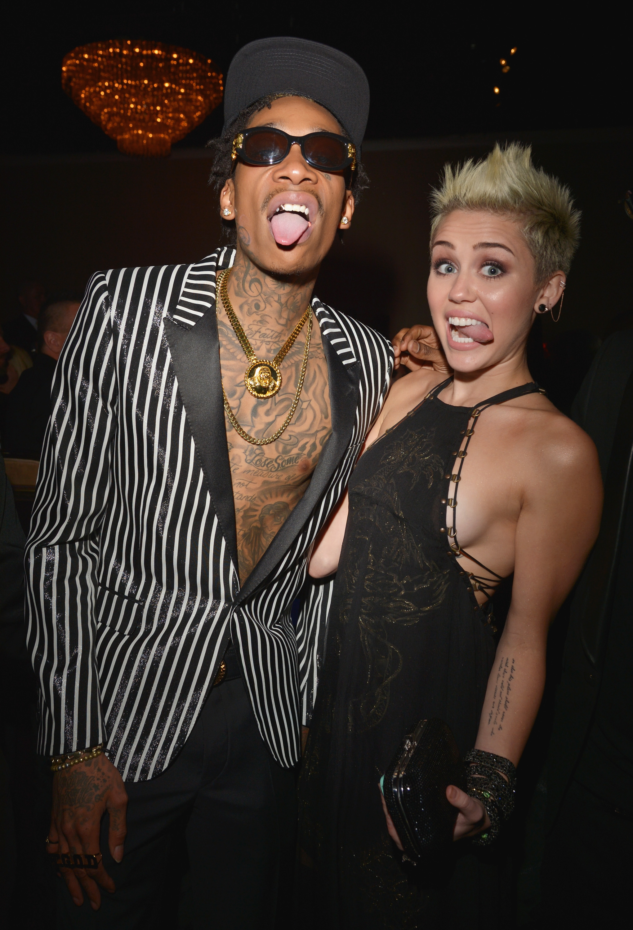 Wiz Khalifa and Miley Cyrus during the 55th Annual Grammy Awards Pre-Grammy Gala and Salute to Industry Icons honoring L.A. Reid on February 9, 2013, in Los Angeles, California. | Source: Getty Images
