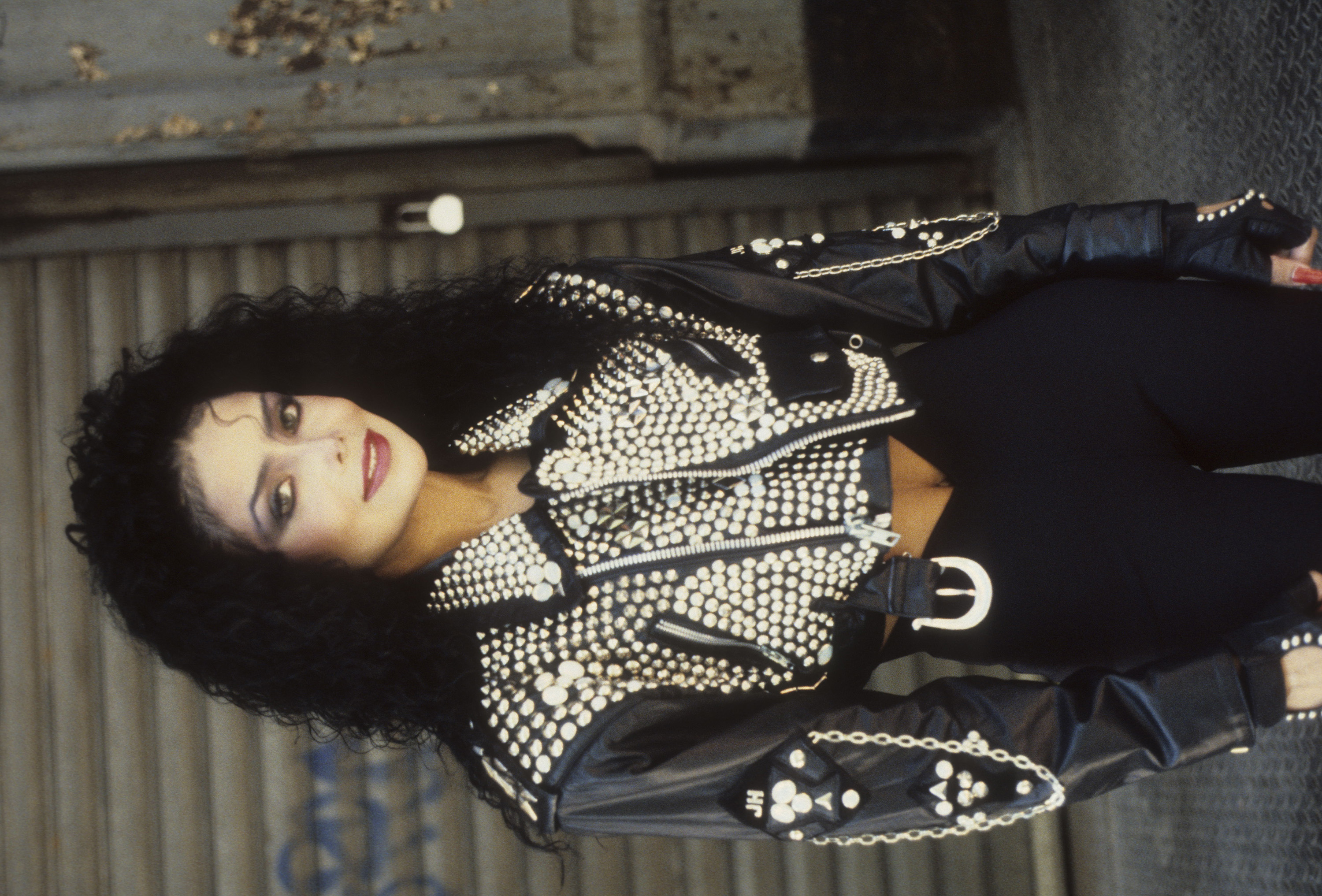 La Toya Jackson sports a studded leather jacket on the set of her music video for "You Blew" in New York City. Her edgy look, complete with dark curls and bold red lips, captured the rebellious pop-rock aesthetic of the era.