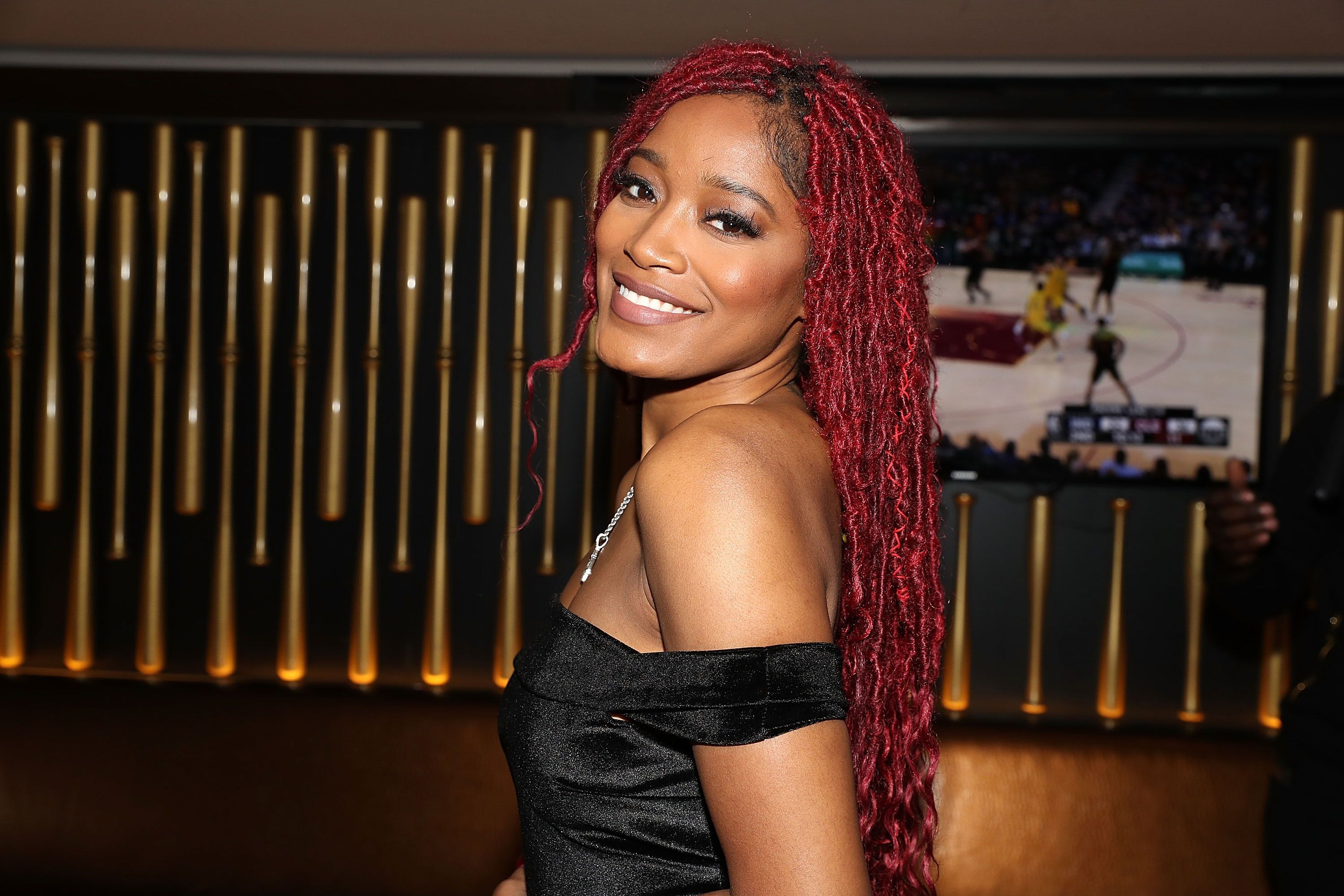 Keke Palmer smiling for the camera at a formal event | Source: Getty Images/GlobalImagesUkraine