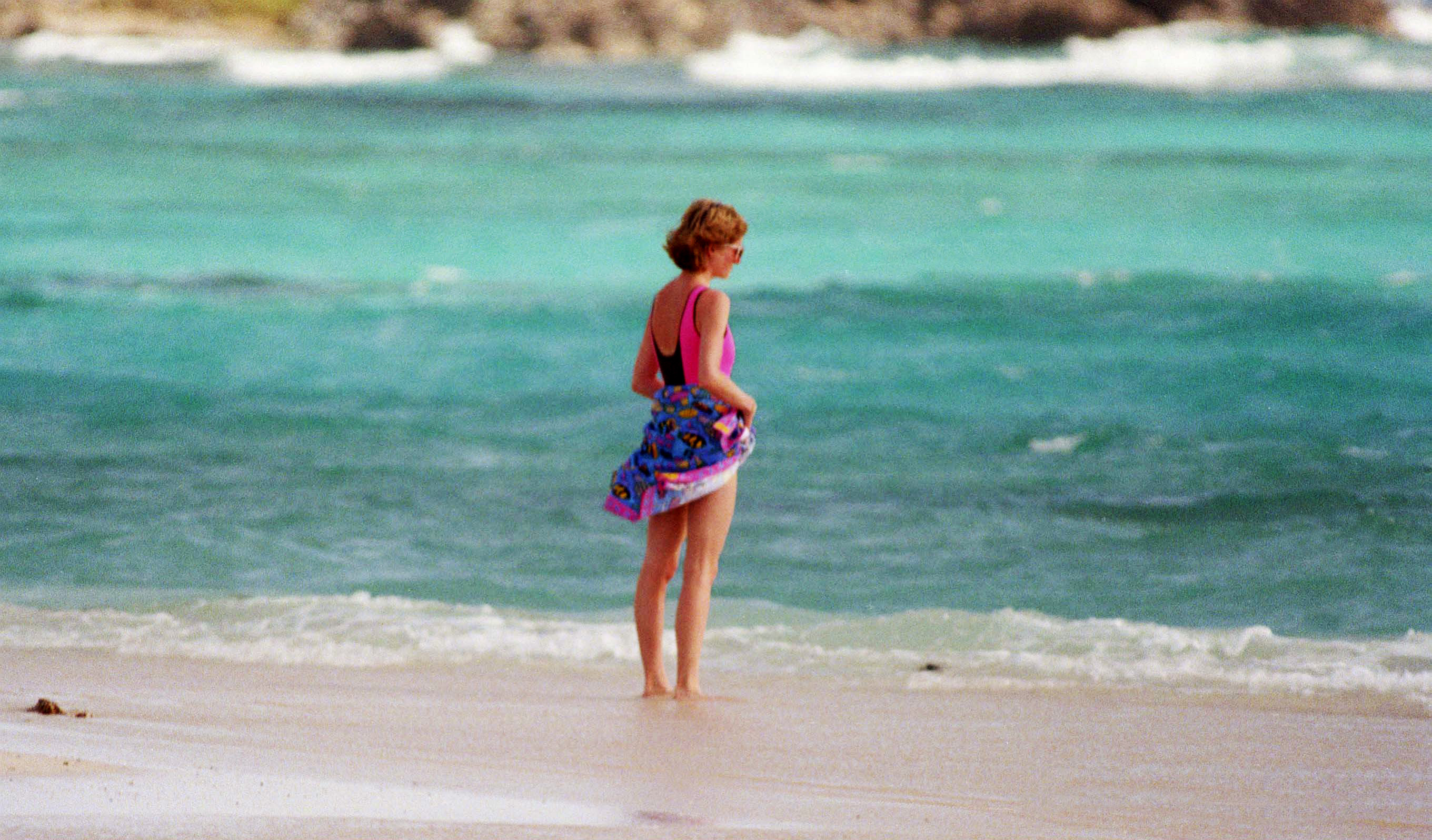 Diana, Princess Of Wales, in a pink and black swimming costume on January 9, 1989 in the British Virgin Islands | Source: Getty Images