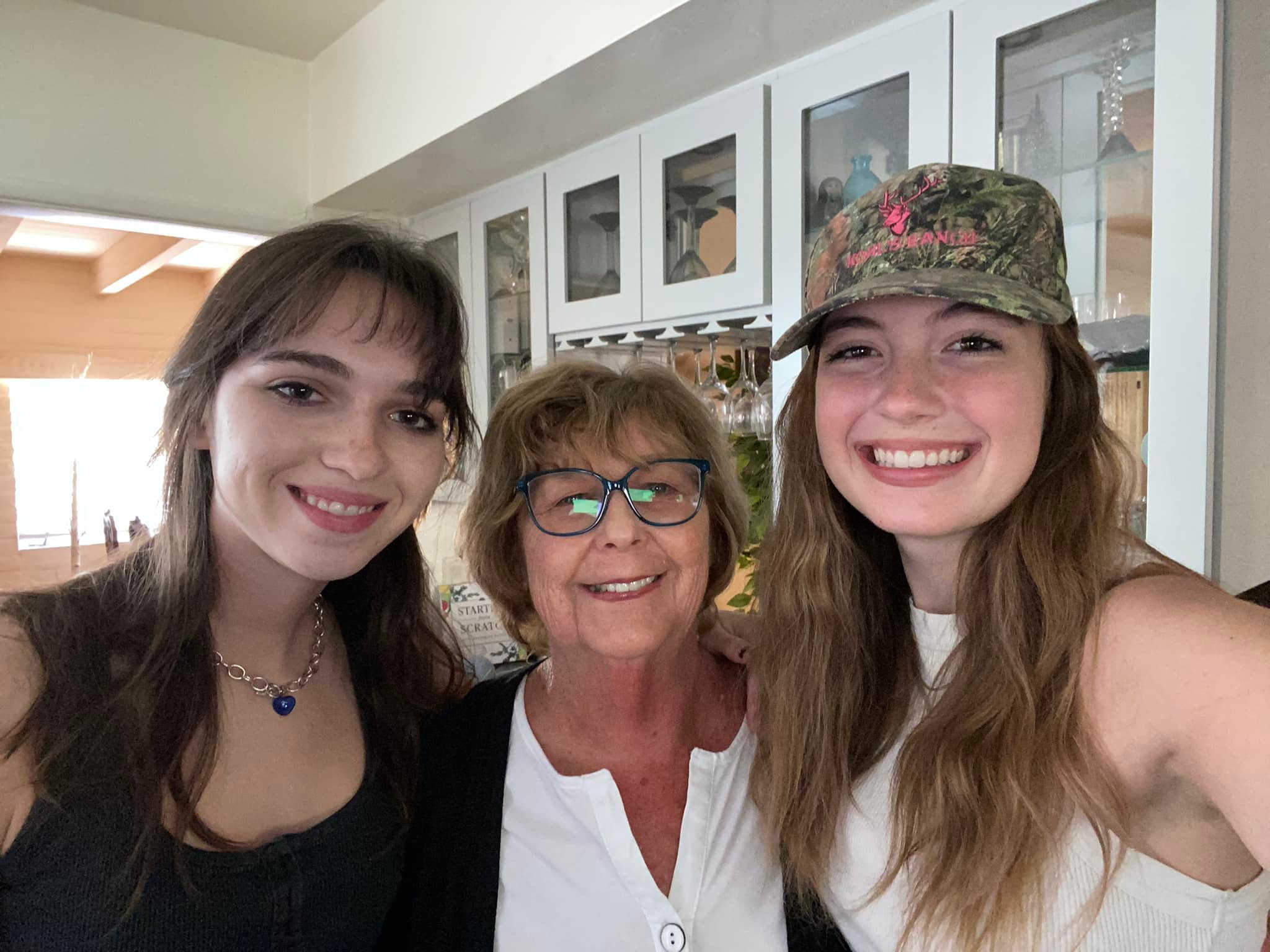 Nancy Guthrie and her nieces smile at the camera, from a post dated May 18, 2022. | Source: Facebook/NancyGuthrie