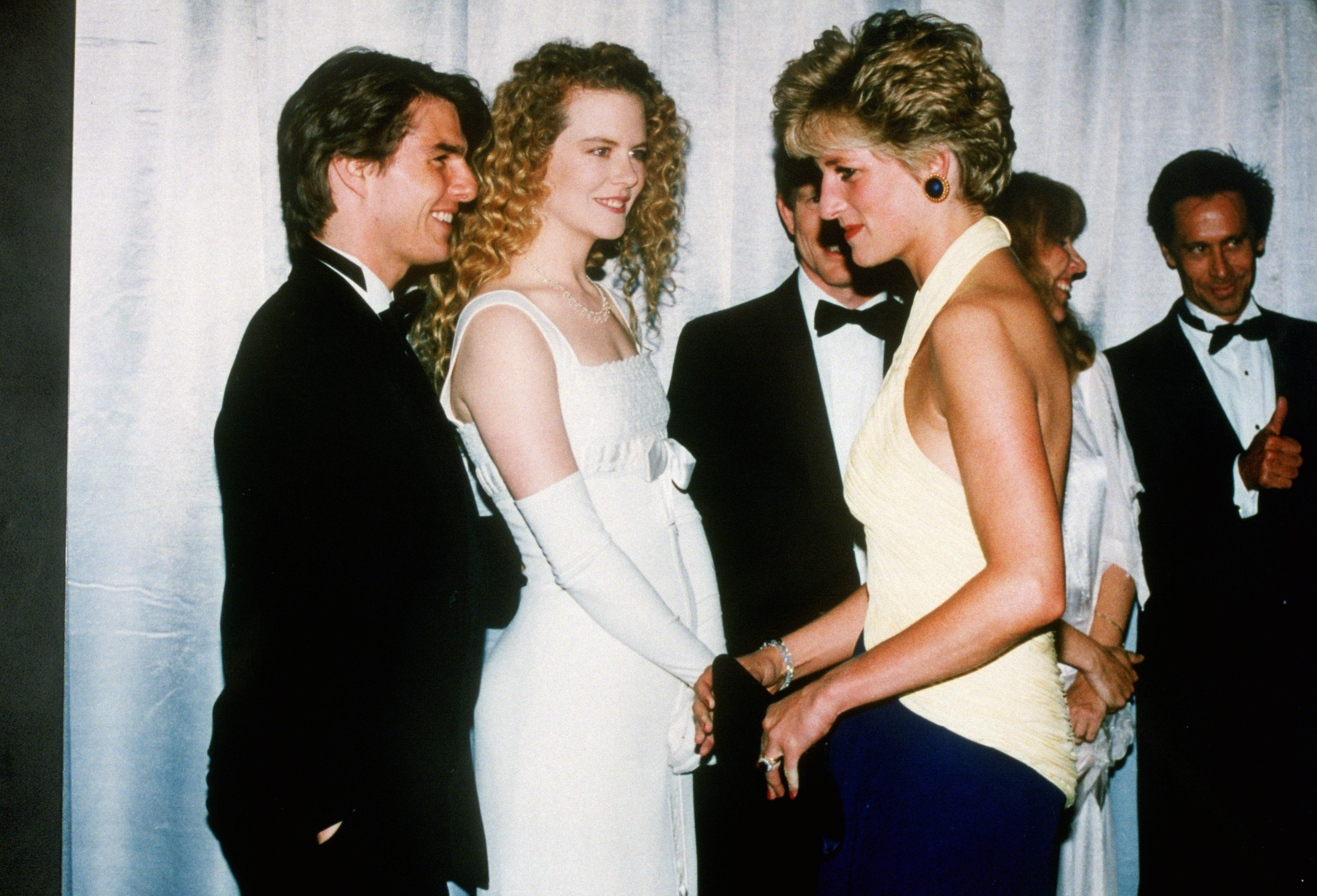 Diana, Princess of Wales meets actors Tom Cruise and Nicole Kidman at the premiere of "Far and Away" at the Leicester Square Empire Cinema  | Source: Getty Images