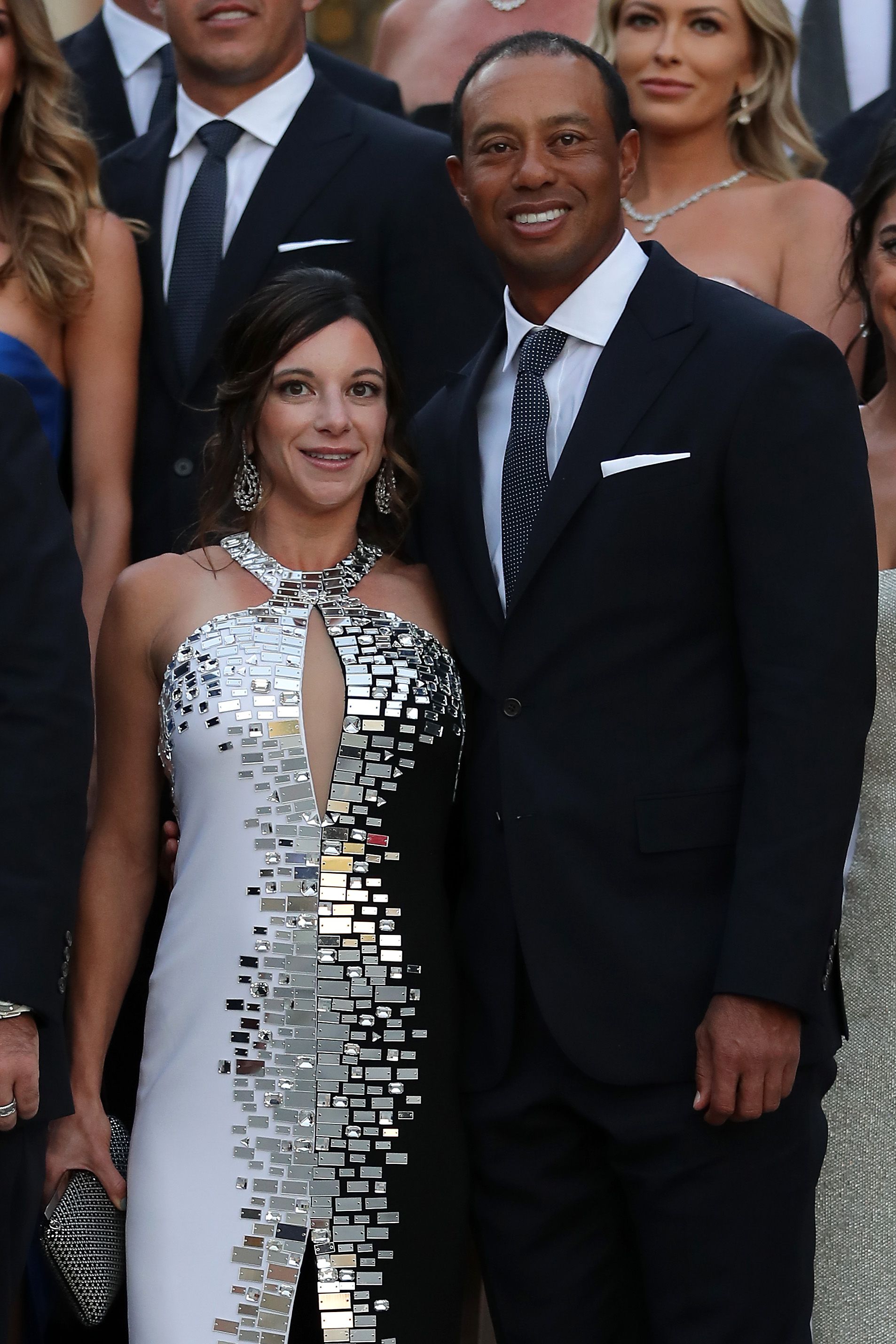 Tiger Woods poses with girlfriend Erica Herman before the Ryder Cup gala dinner at the Palace of Versailles ahead of the 2018 Ryder Cup on September 26, 2018 in Versailles, France. | Source: Getty Images