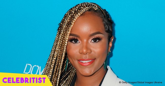 LeToya Luckett bares her baby bump in tiny shorts and crop top 