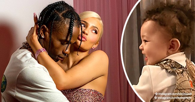 Kylie Jenner's baby Stormi dances along to dad Travis Scott's performance while watching him on TV