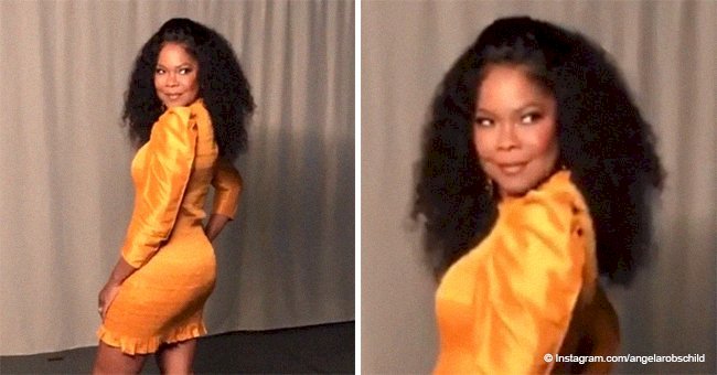  'The Haves & Have Nots' Angela Robinson sets hearts racing in tight orange mini dress in new video