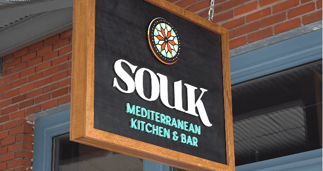 Sign of Souk Mediterranean Kitchen & Bar in downtown Toledo, Ohio | Photo: YouTube/WTOL11