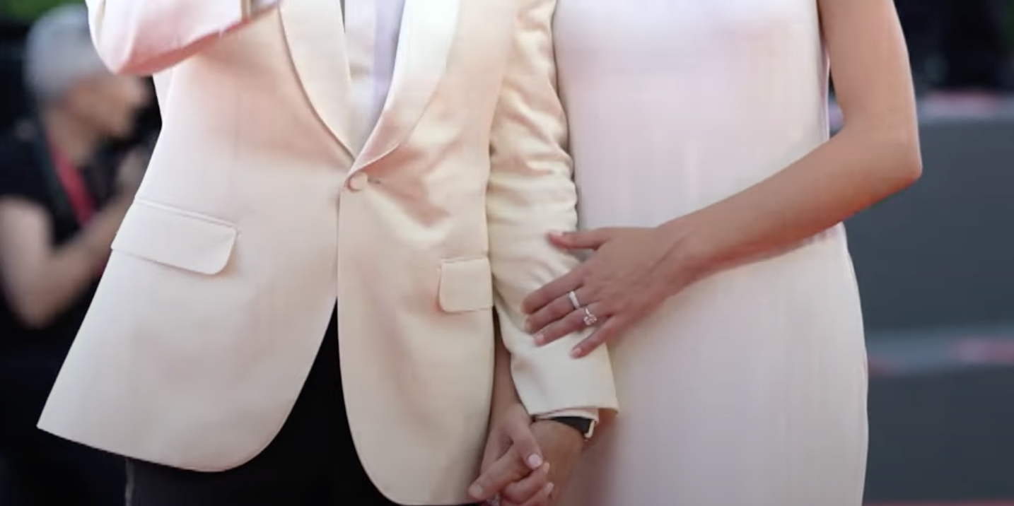 Nicole Brydon Bloom flashing her ring during the Venice premiere of 