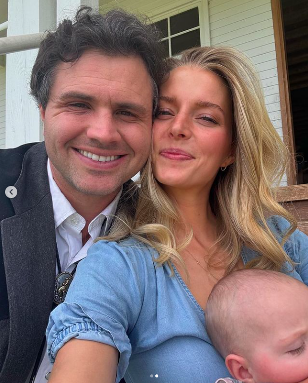 Daniel and Hannah Neeleman with their baby, posing for a picture, posted on May 13, 2024 | Source: Instagram/ballerinafarm