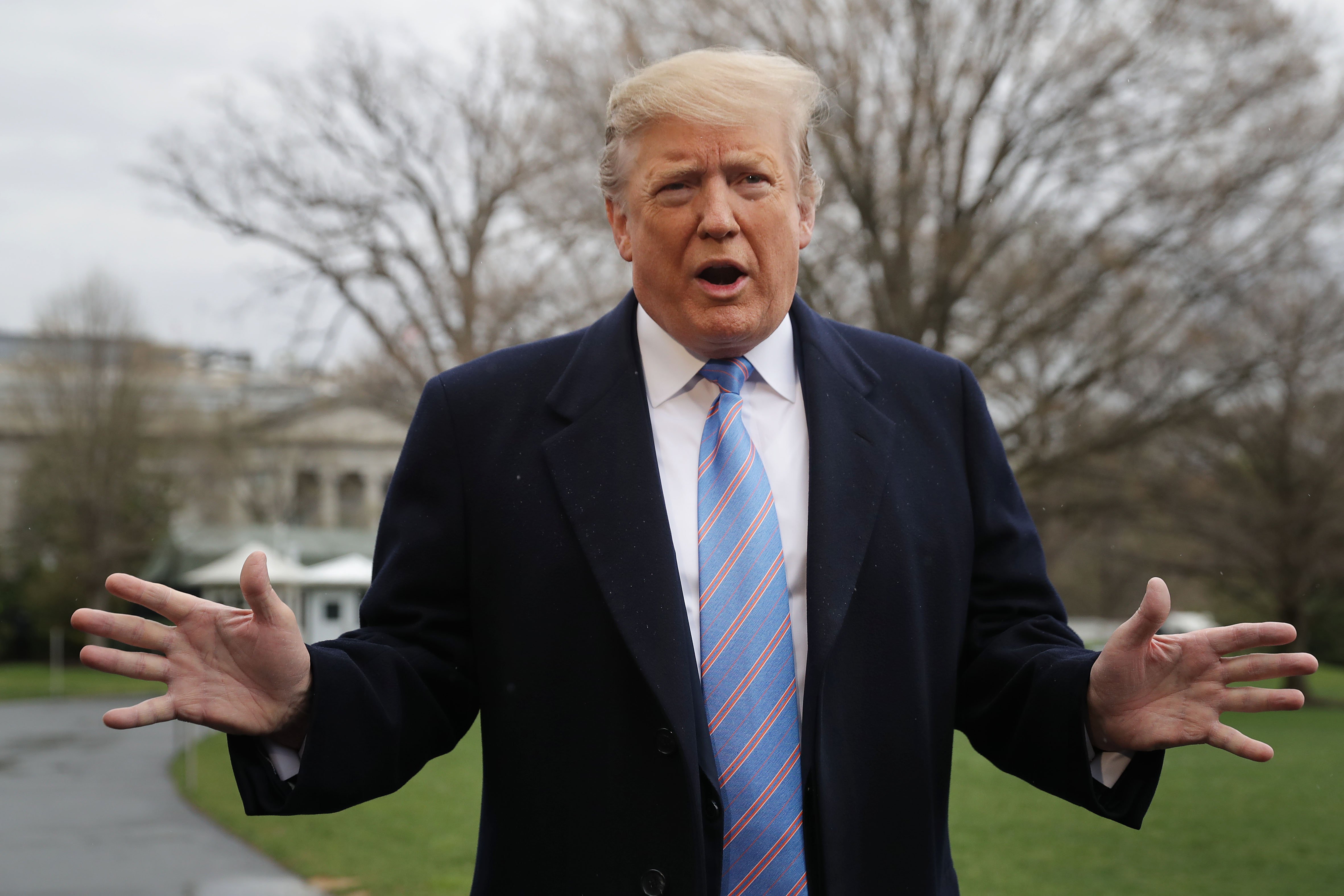 Donald Trump talking to the media before traveling to Southern California to visit the U.S.-Mexico border | Photo: Getty Images