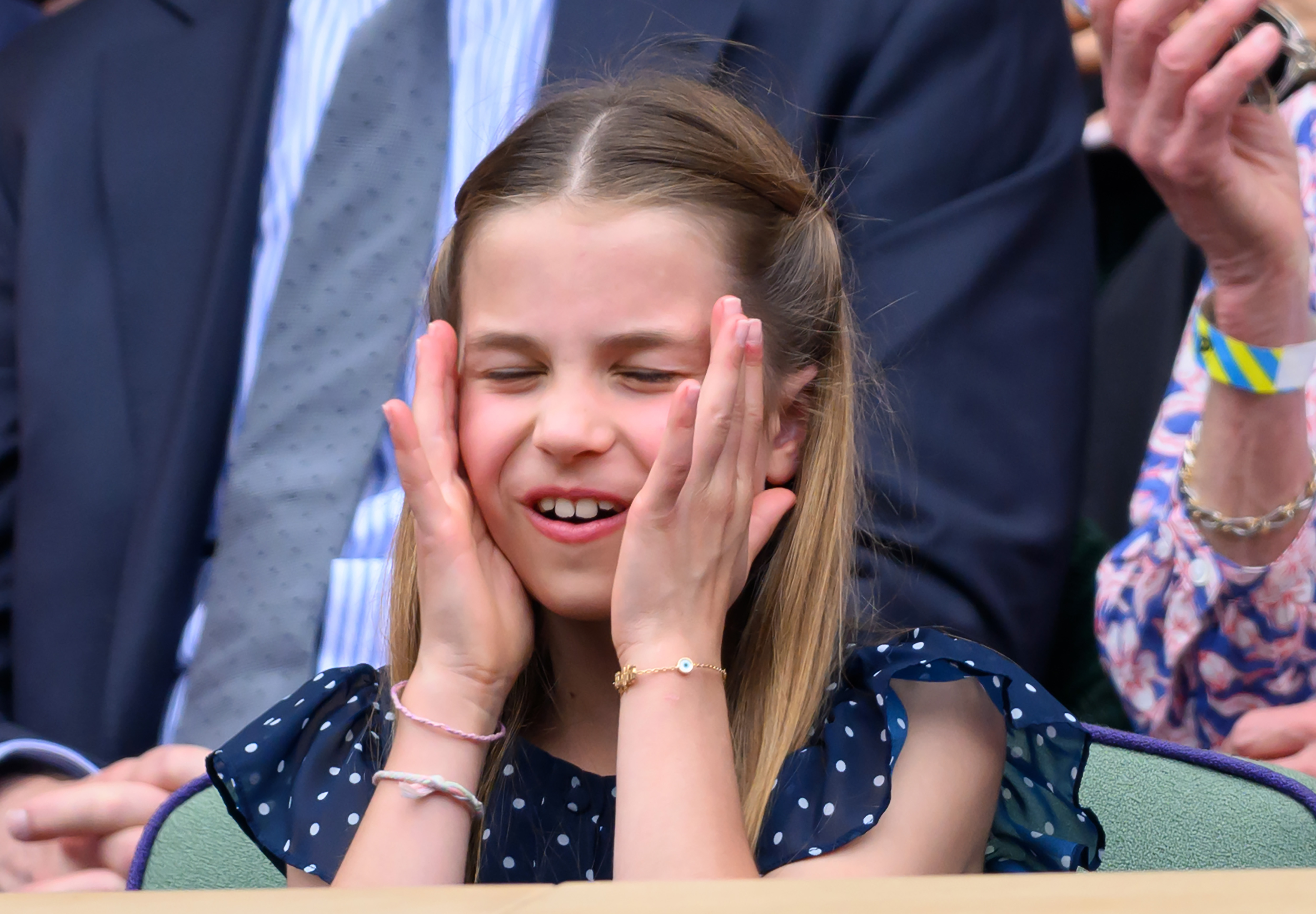 Princess Charlotte closing her eyes in excitement while attending the men's finals at Wimbledon in London on July 14, 2024 | Source: Getty Images