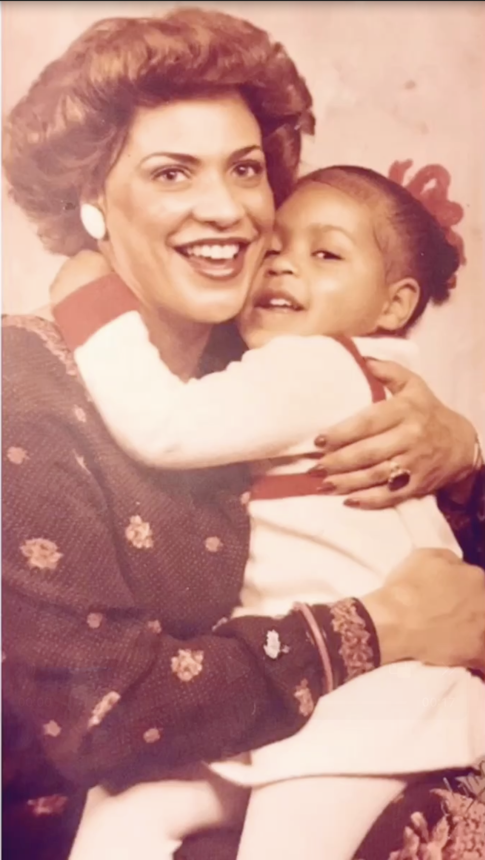 A young Sheinelle Jones hugs her mom, from a post dated May 14, 2023. | Source: Instagram/sheinelle_o