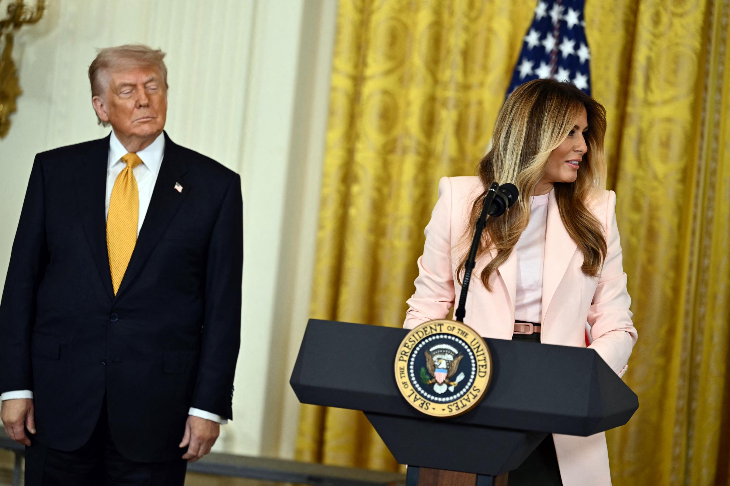 Donald Trump and Melania Trump participate in a Military Mother's Day Event in the East Room of the White House on May 6, 2026, in Washington, DC | Source: Getty Images